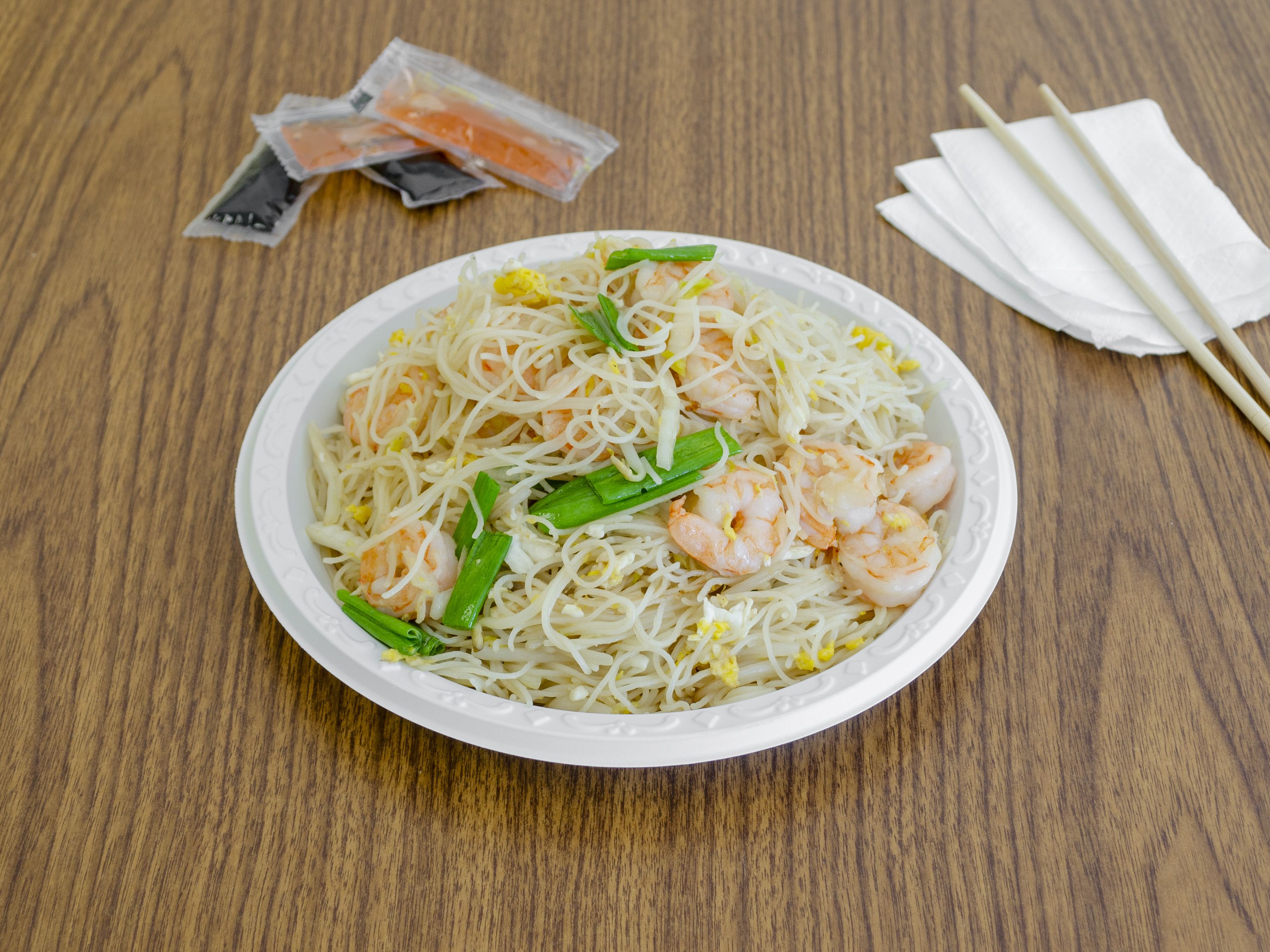 Order 61. Shrimp Chow Mei Fun food online from New China Restaurant store, Huntington on bringmethat.com