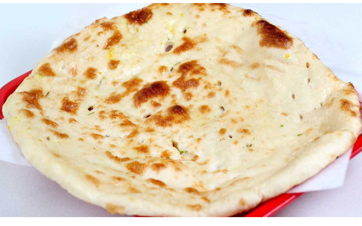 Order Butter Naan food online from Yummy Asia store, San Francisco on bringmethat.com