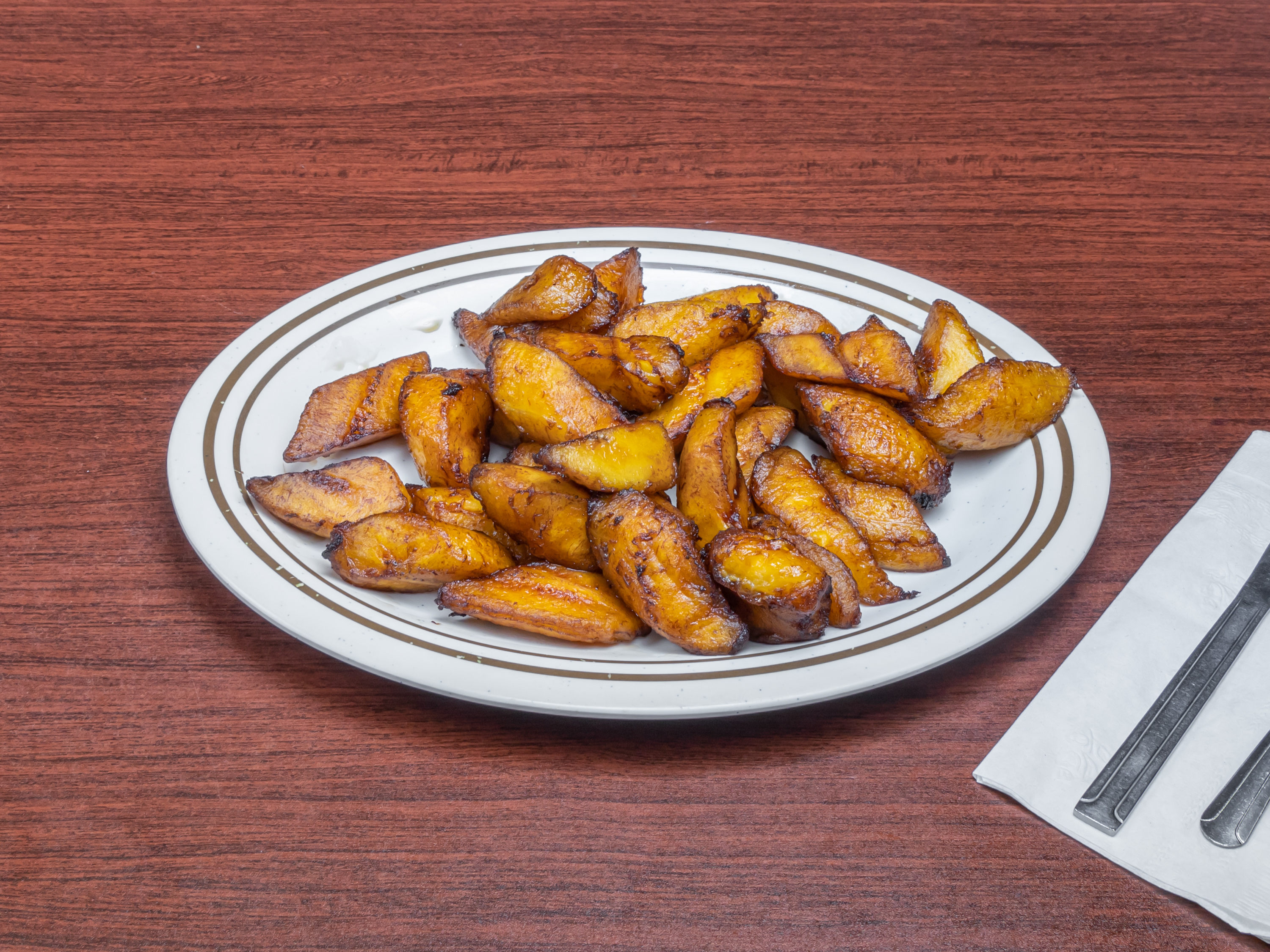 Order Plantain food online from Marie African Restaurant store, Houston on bringmethat.com