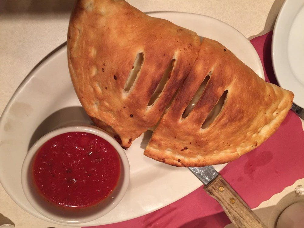 Order Cheese Calzone - Calzone food online from Sophia's Pizza Restaurant store, Winsted on bringmethat.com