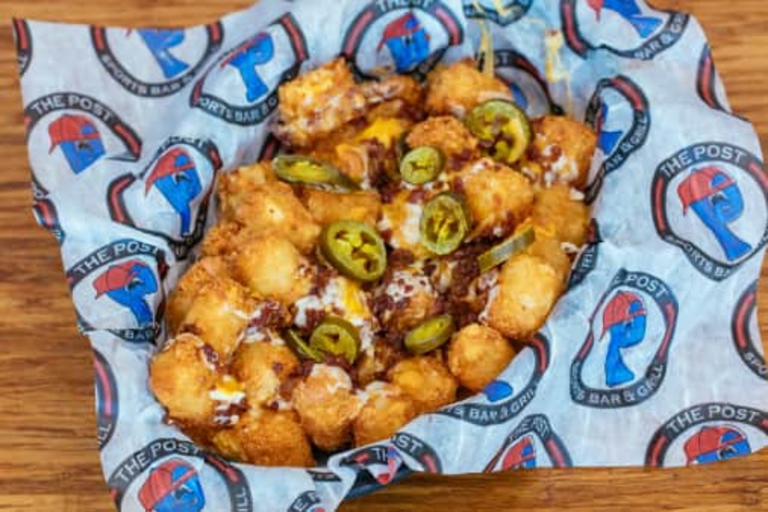 Order Loaded Tots food online from The Post Sports Bar & Grill store, Maplewood on bringmethat.com