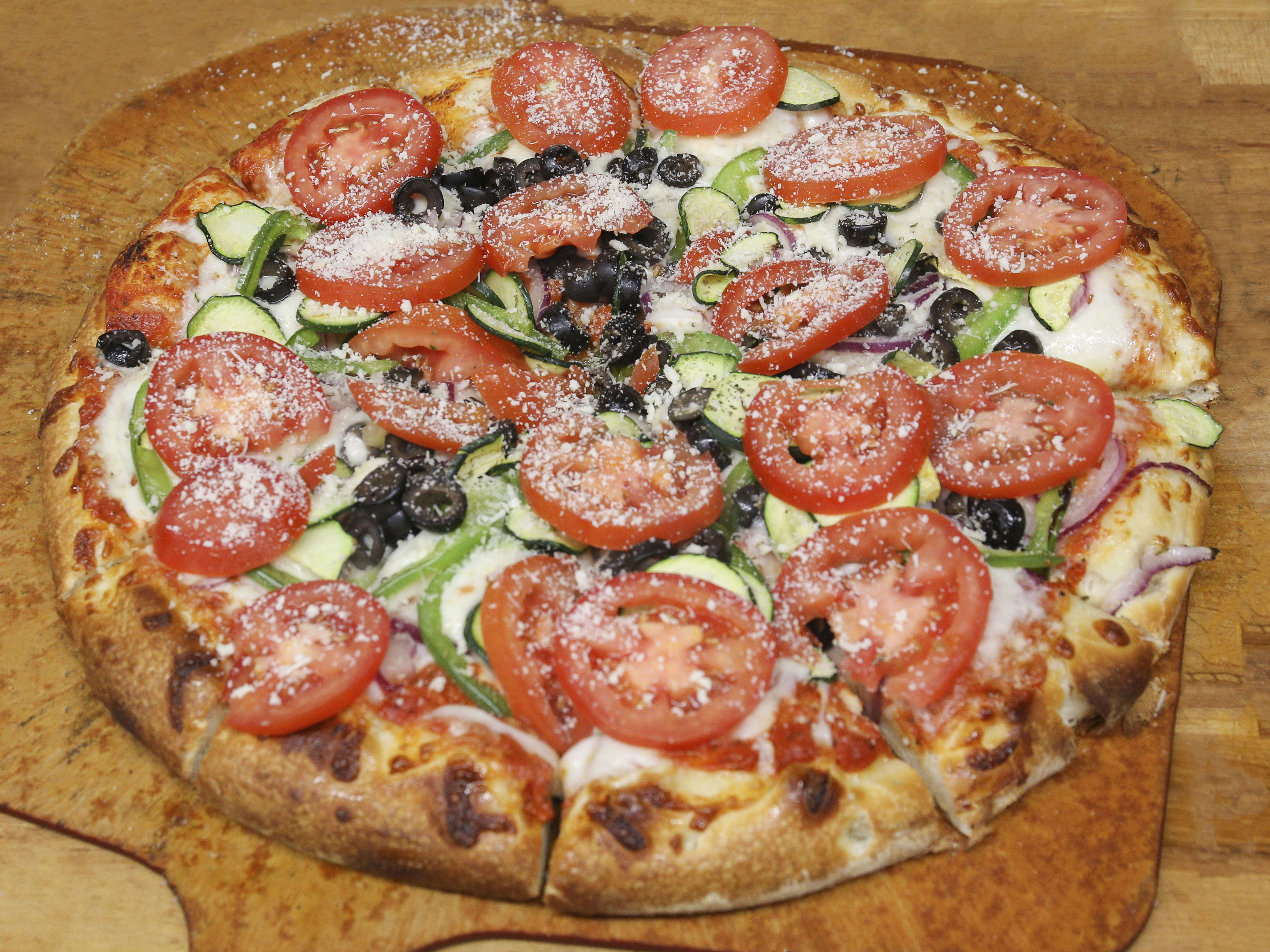 Order 3. The Vegetarian Pizza food online from Legends Pizza store, Cupertino on bringmethat.com