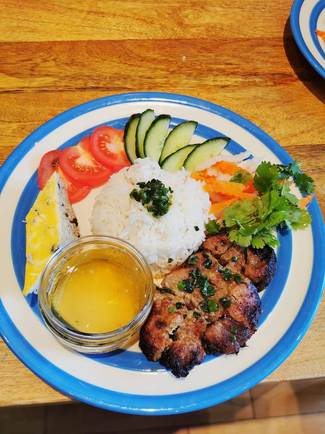 Order Grilled Chicken & meatloaf over Rice- Com ga nuong cha trung food online from Tuyet Mai store, San Francisco on bringmethat.com