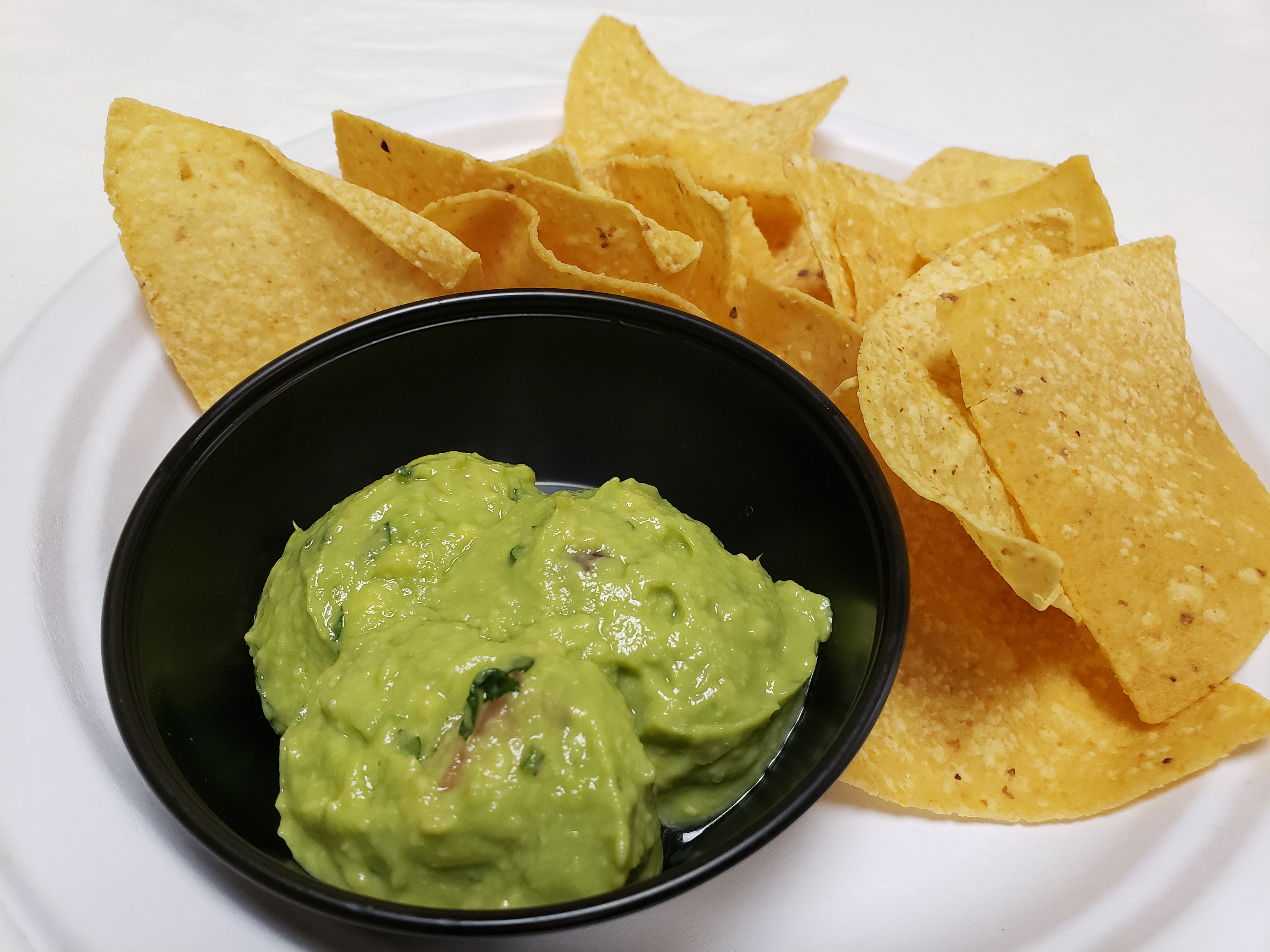Order Chips and Guacamole food online from Poblanos Mexican Cafe store, Dallas on bringmethat.com