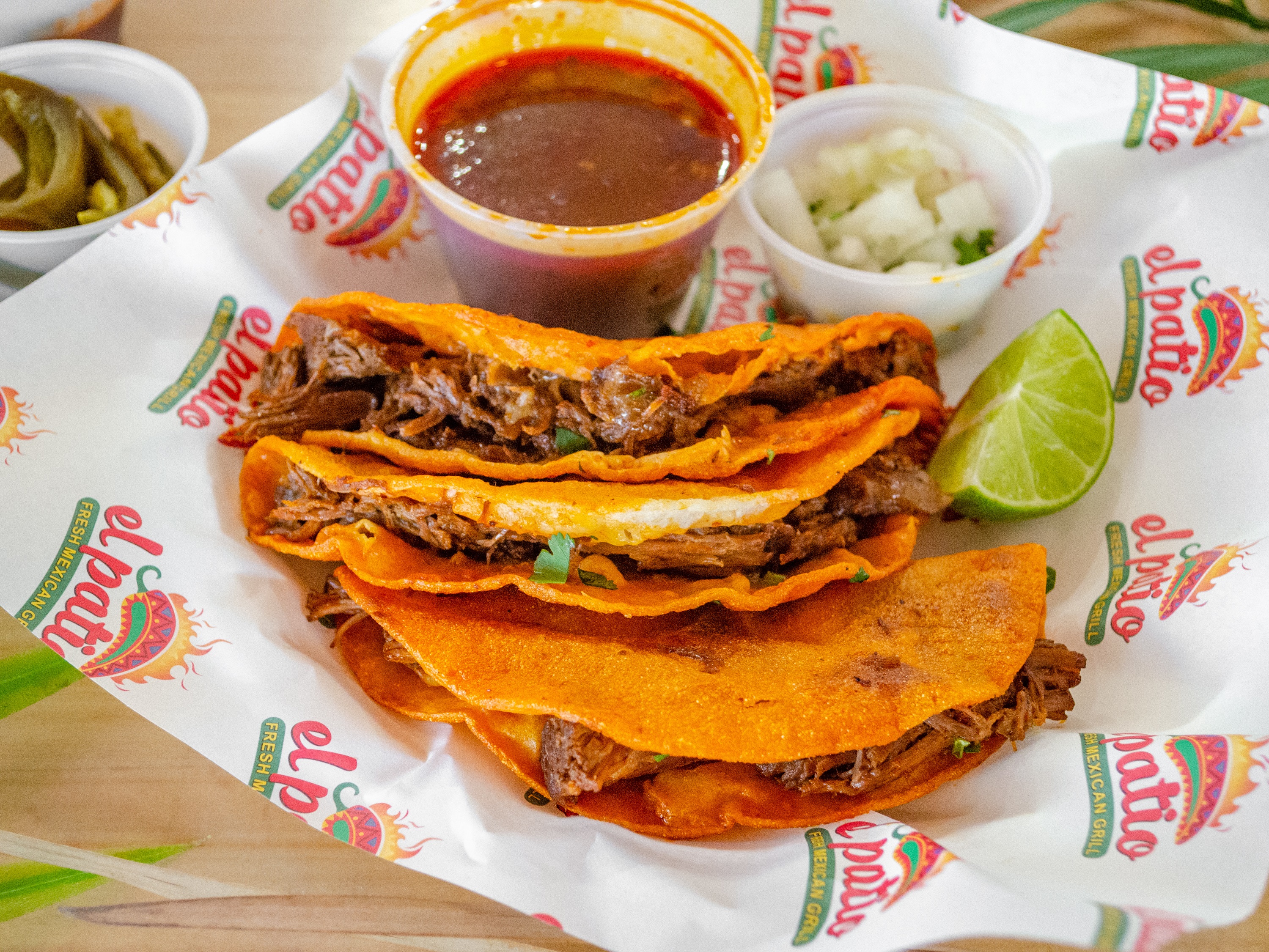 Order Quesabirria Tacos & Consomé food online from El Patio Fresh Mexican Grill store, Davis on bringmethat.com