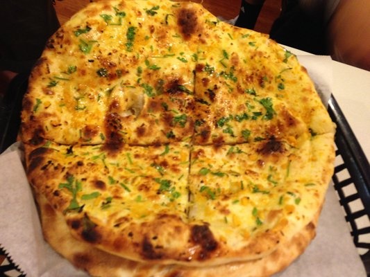 Order Garlic Naan food online from Indian Domino's Pizza store, San Francisco on bringmethat.com