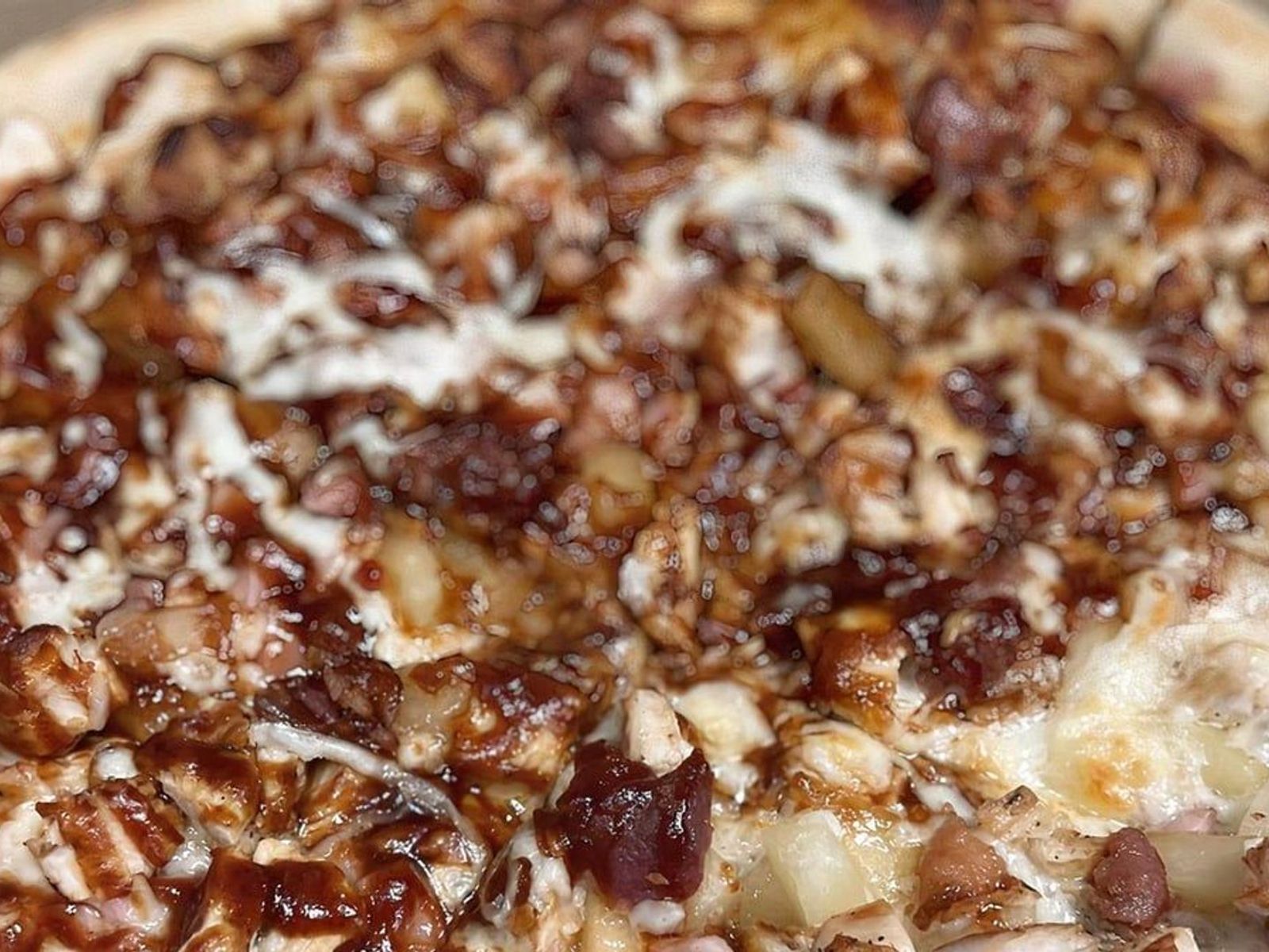 Order Hawaiian BBQ Chicken food online from Lisa's Family Pizzeria store, Wakefield on bringmethat.com