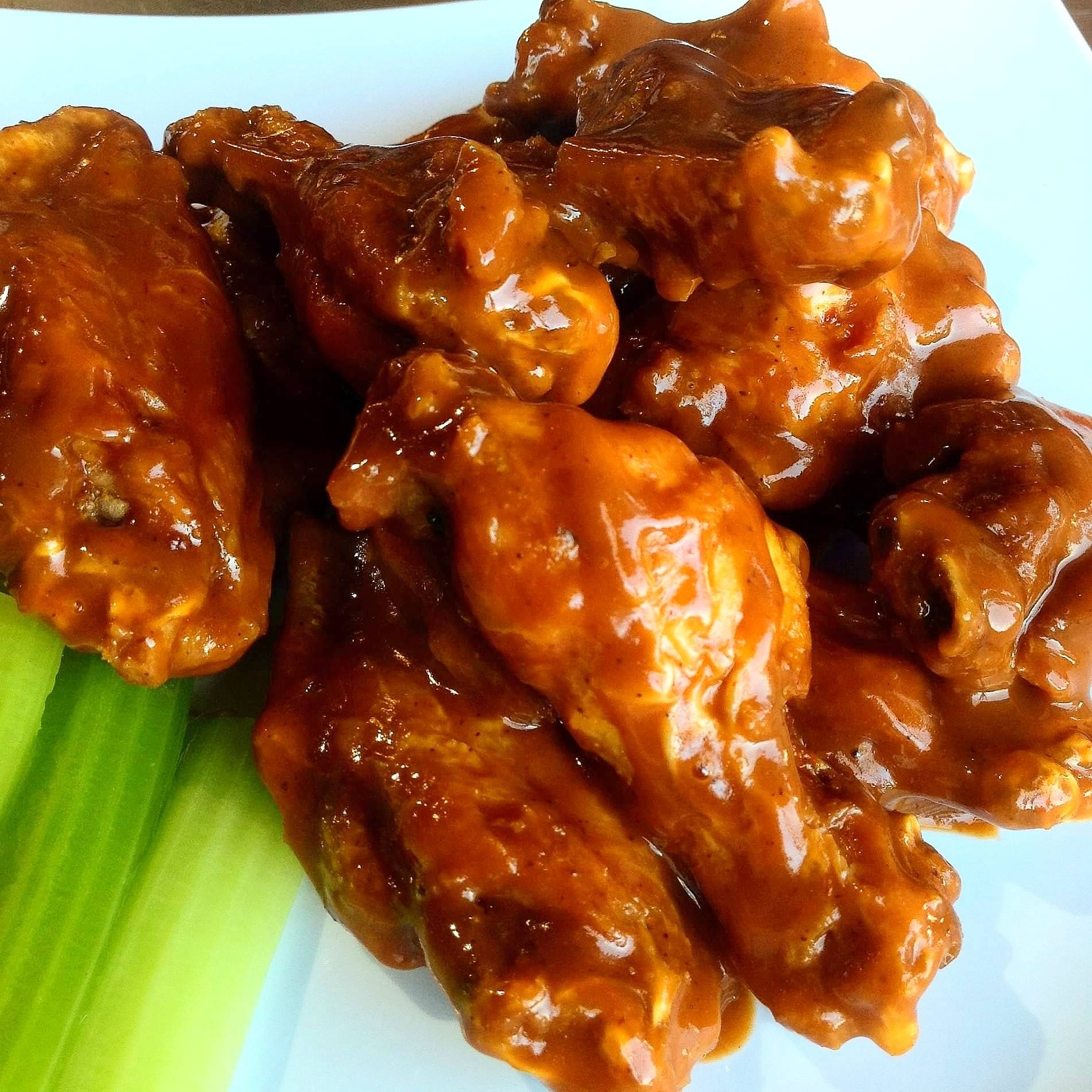 Order Rocky's Wings food online from Rocky's Pizza store, Huntersville on bringmethat.com