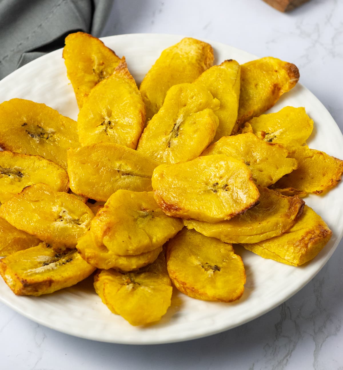 Order 4. Fried Plantain(Green banana) food online from Chen's Yummy House store, Dumont on bringmethat.com