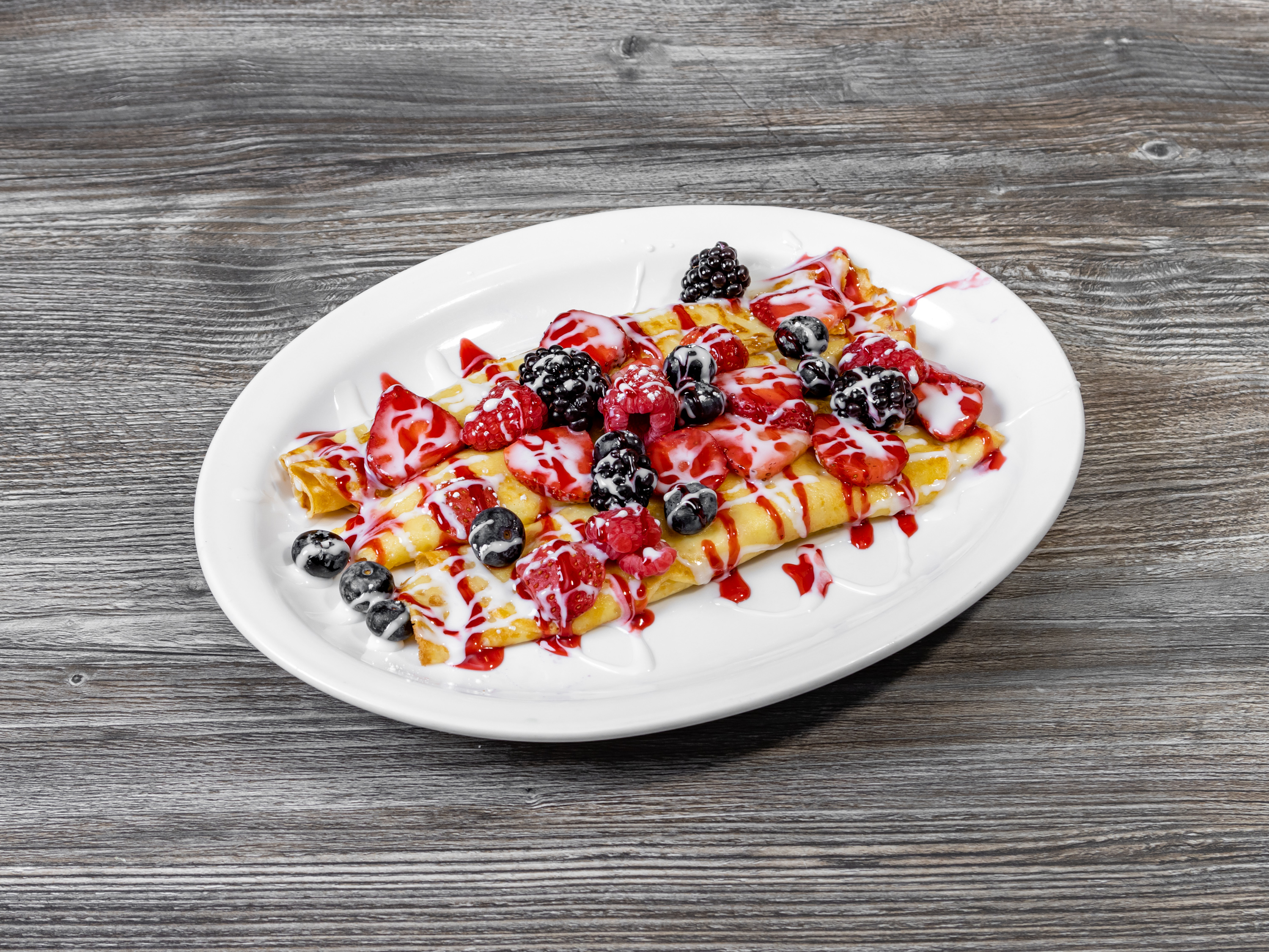 Order Berry Bliss Crepe food online from Eggspress Cafe store, Lewisville on bringmethat.com