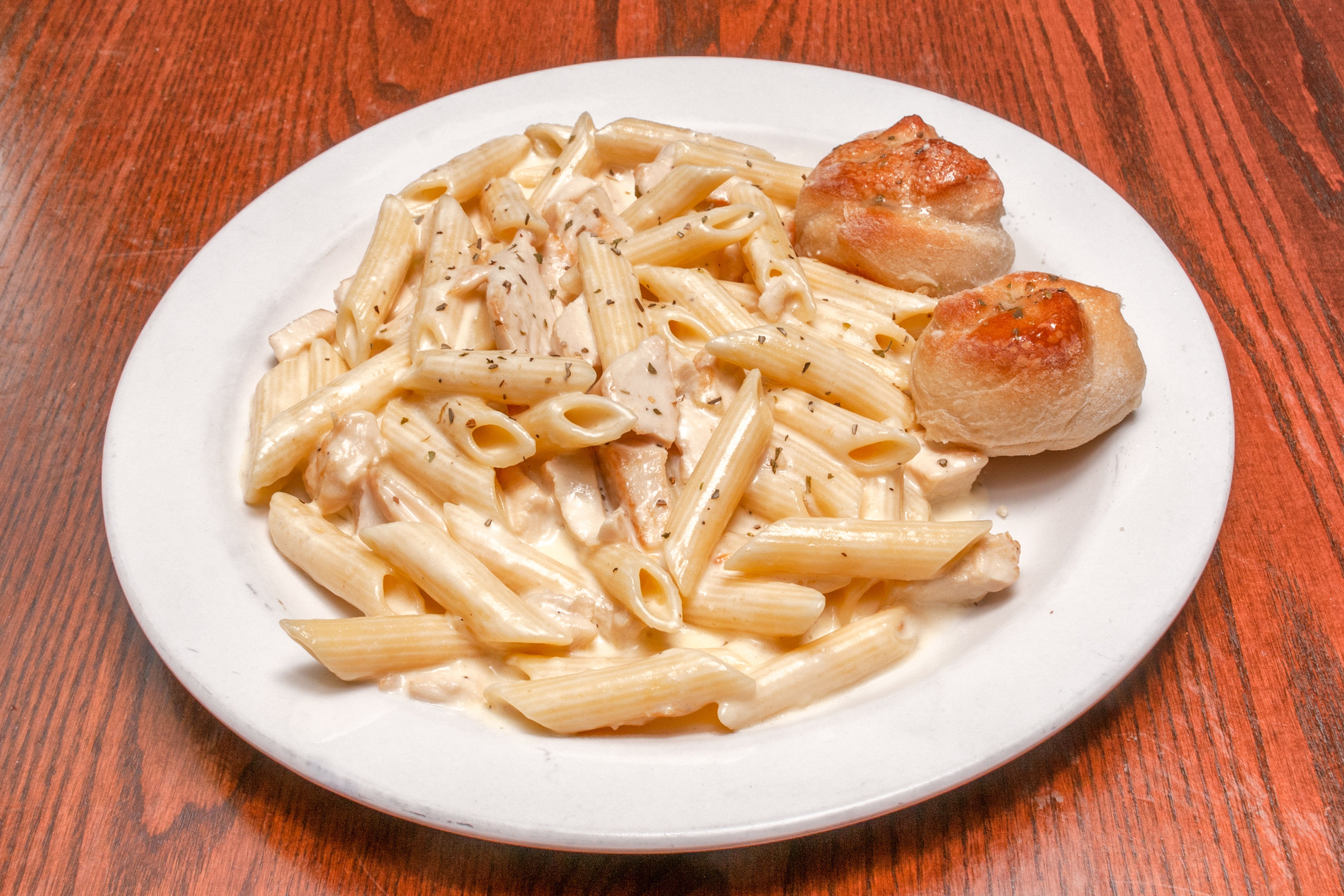 Order Penne Alfredo - Pasta food online from Primo Pizza Ny Style store, Cary on bringmethat.com
