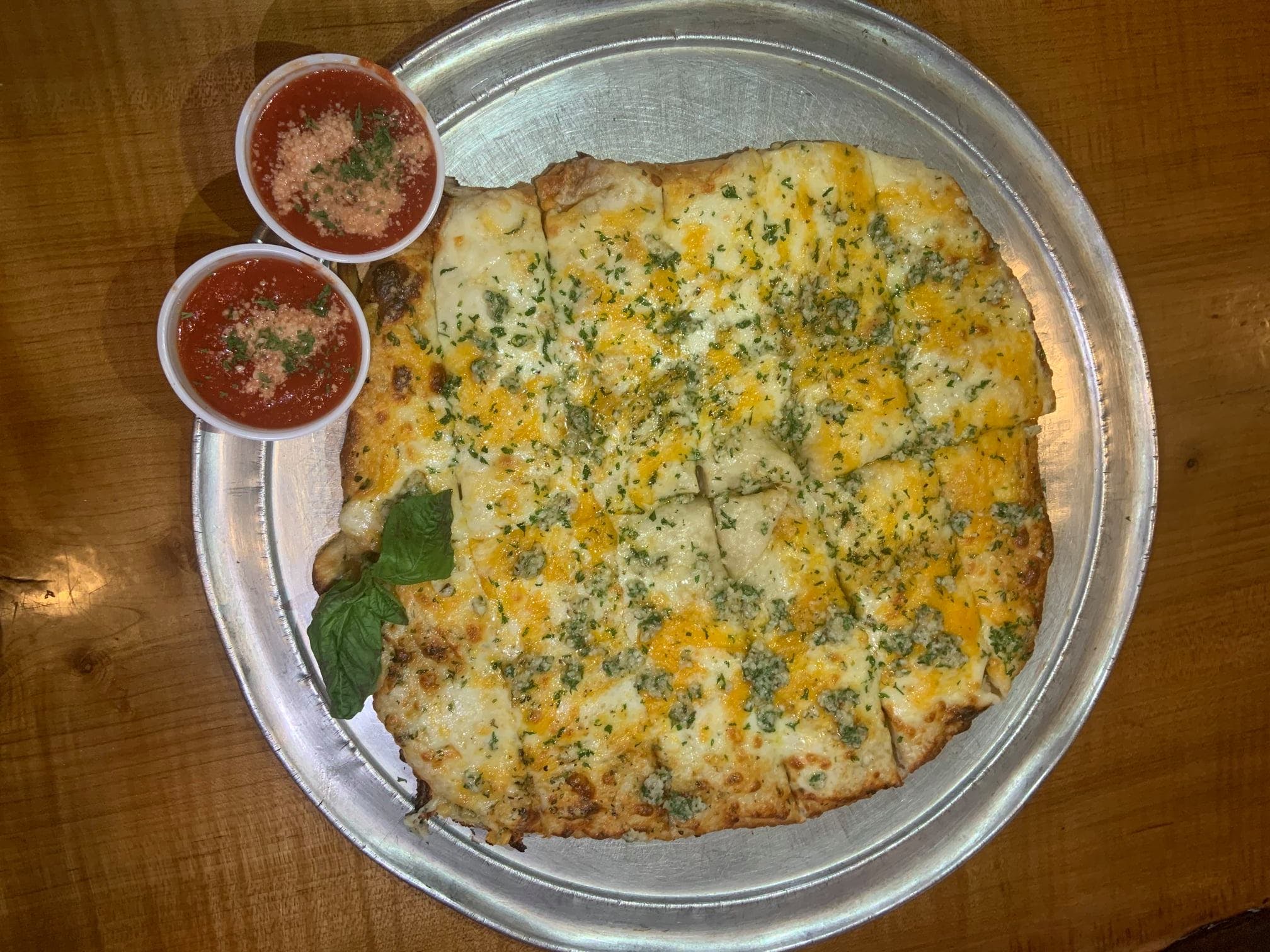 Order Cheesy Bread - Appetizer food online from Ramunto's Brick Oven Pizza store, North Adams on bringmethat.com
