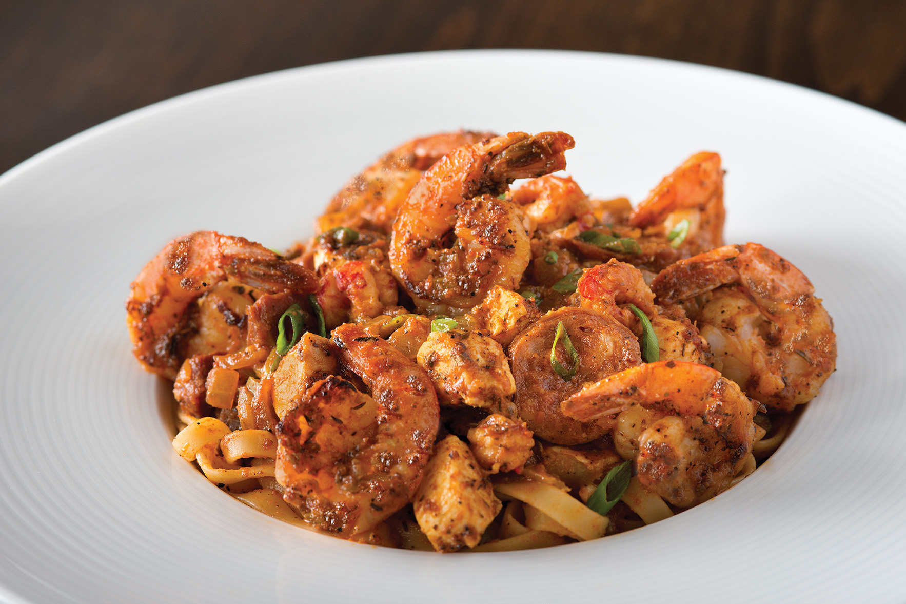 Order Jambalaya Linguine Fini  food online from California Pizza Kitchen - River City Dr store, Jacksonville on bringmethat.com
