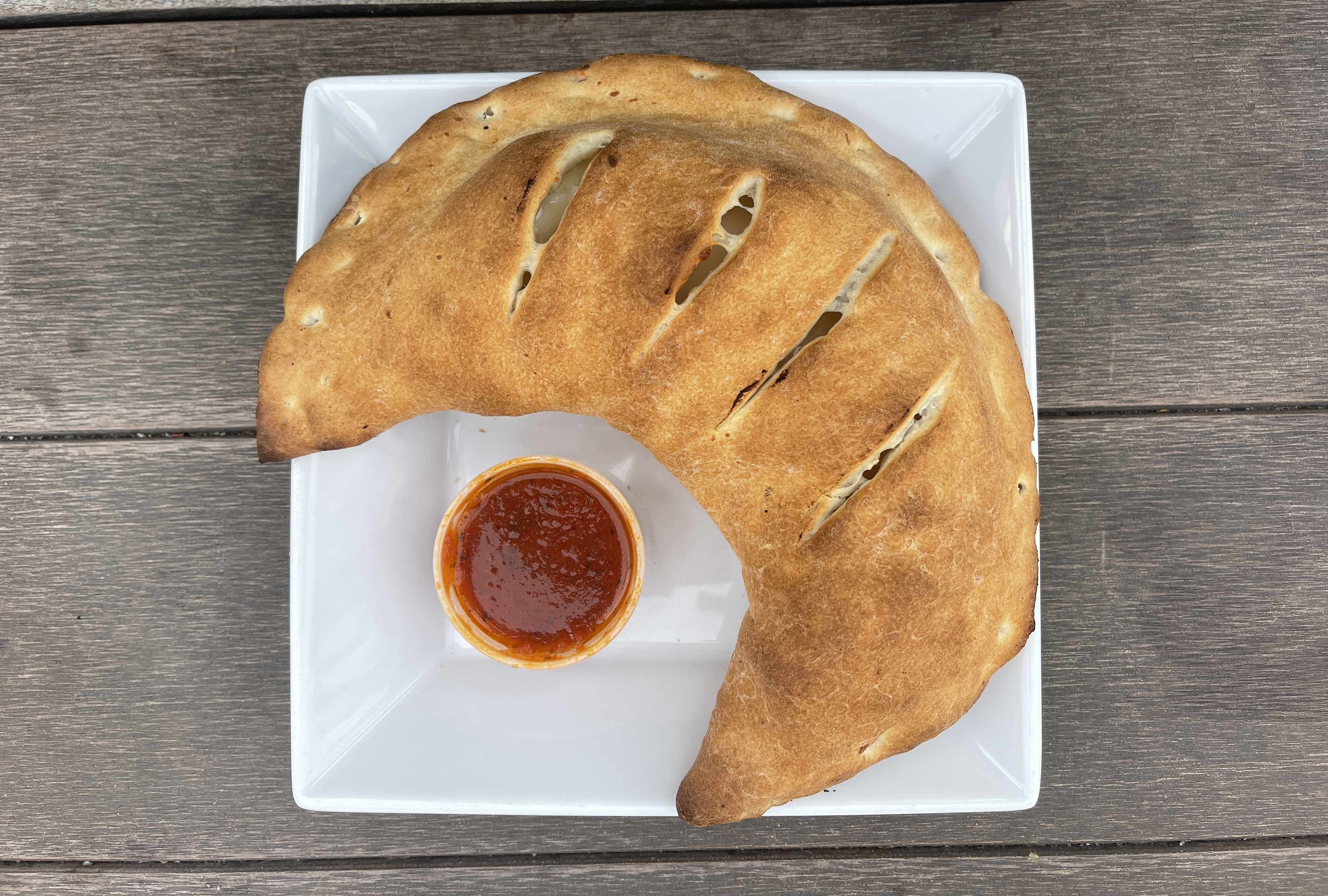 Order NY Calzone food online from Stefano Pizzeria store, Santa Monica on bringmethat.com