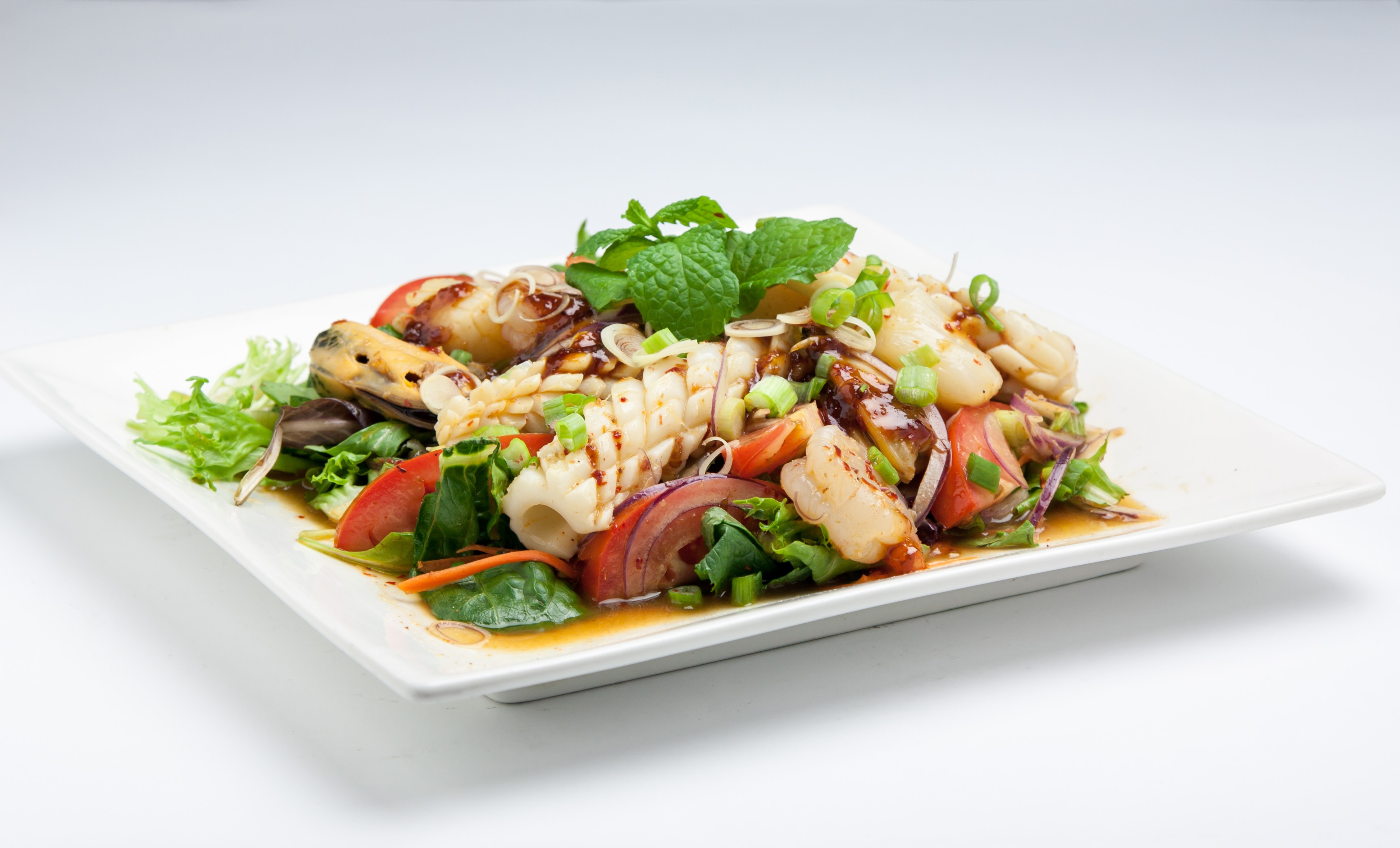 Order Spicy Calamari Salad food online from Basil Thai Bistro store, San Diego on bringmethat.com
