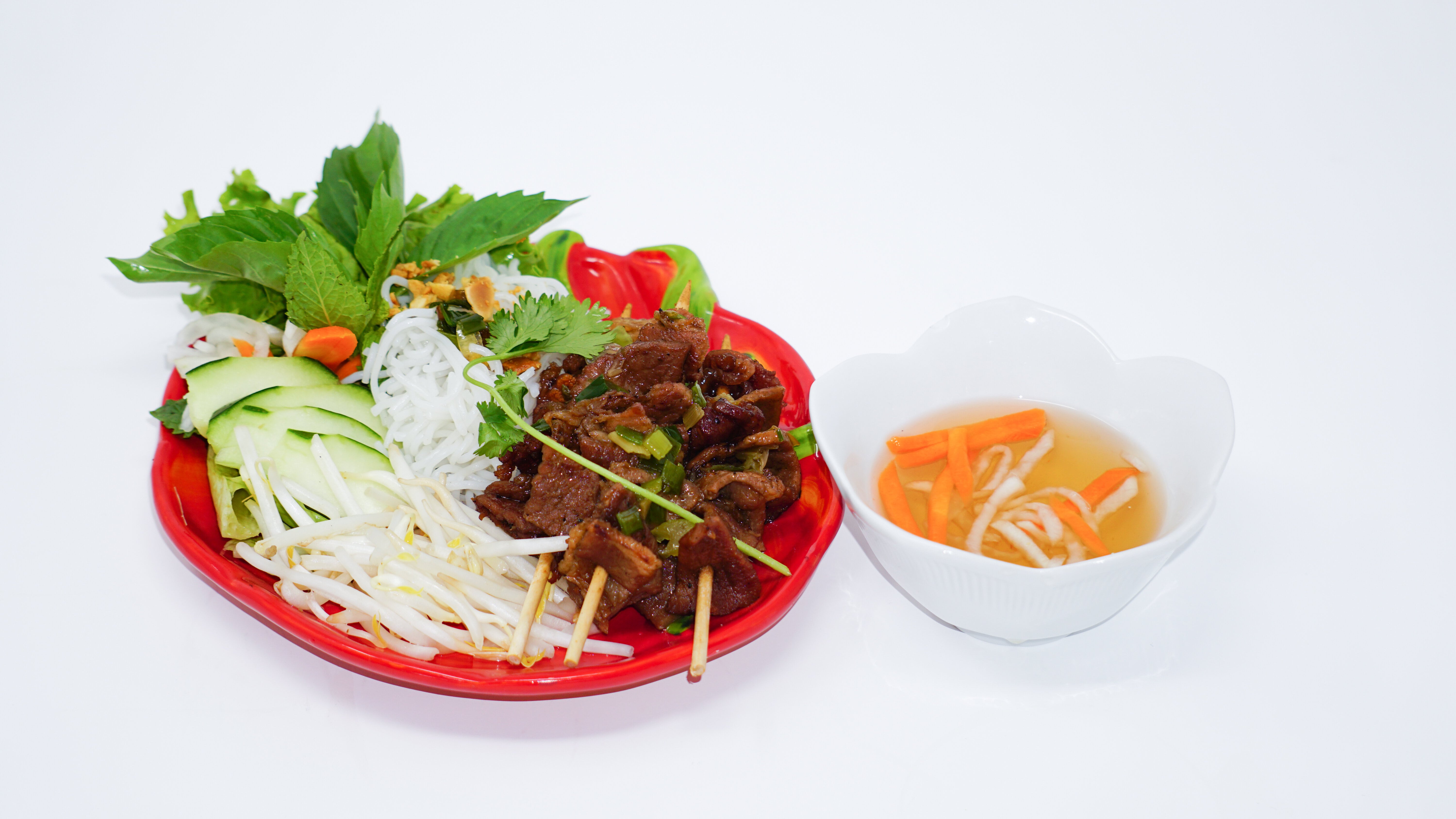 Order Grilled Pork Skewers (Thit Nuong Xien) food online from Now Pho store, Denver on bringmethat.com