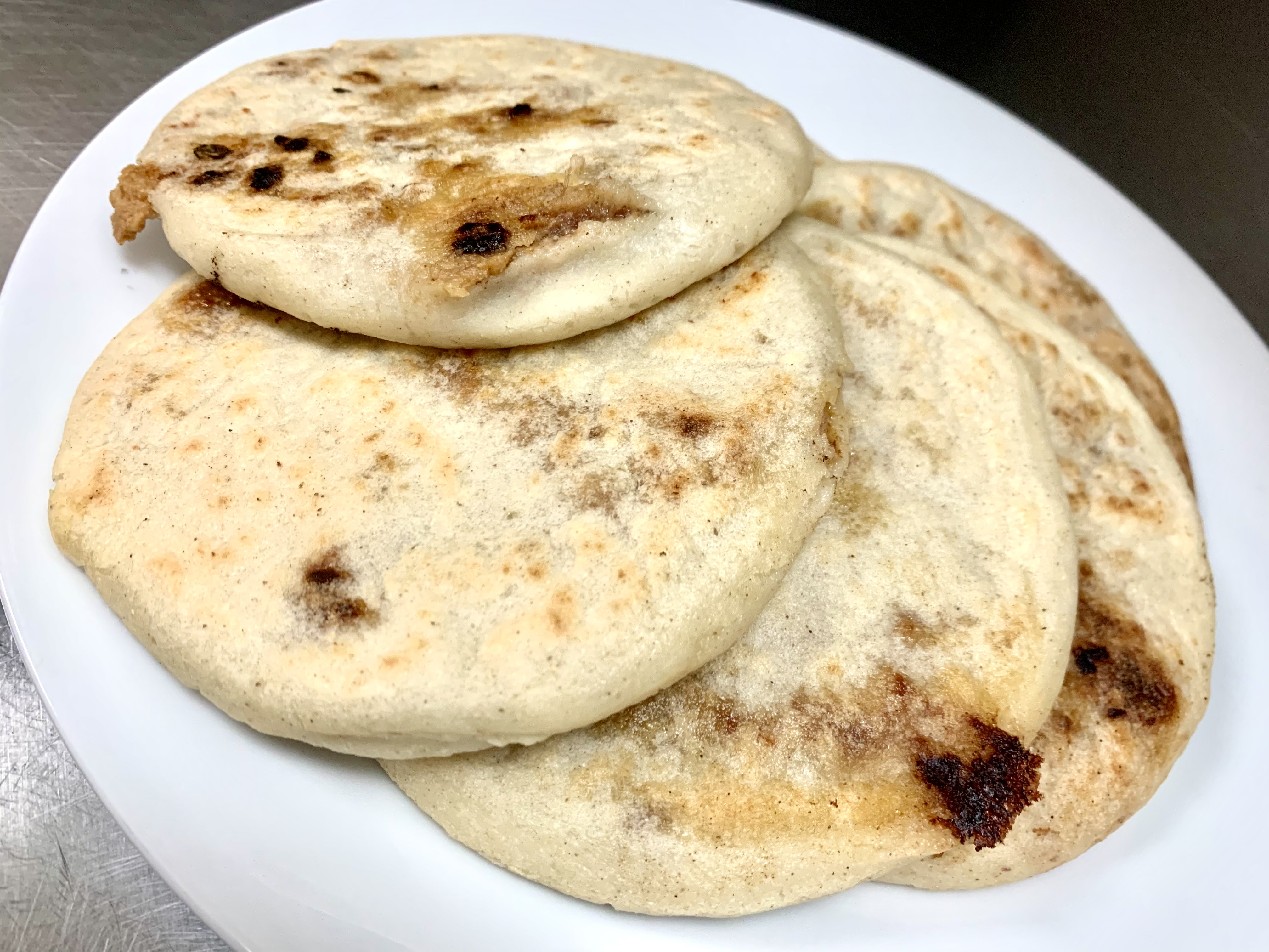 Order G1. Pupusas Pork, Cheese and Beans food online from Guana Cafe store, Irving on bringmethat.com