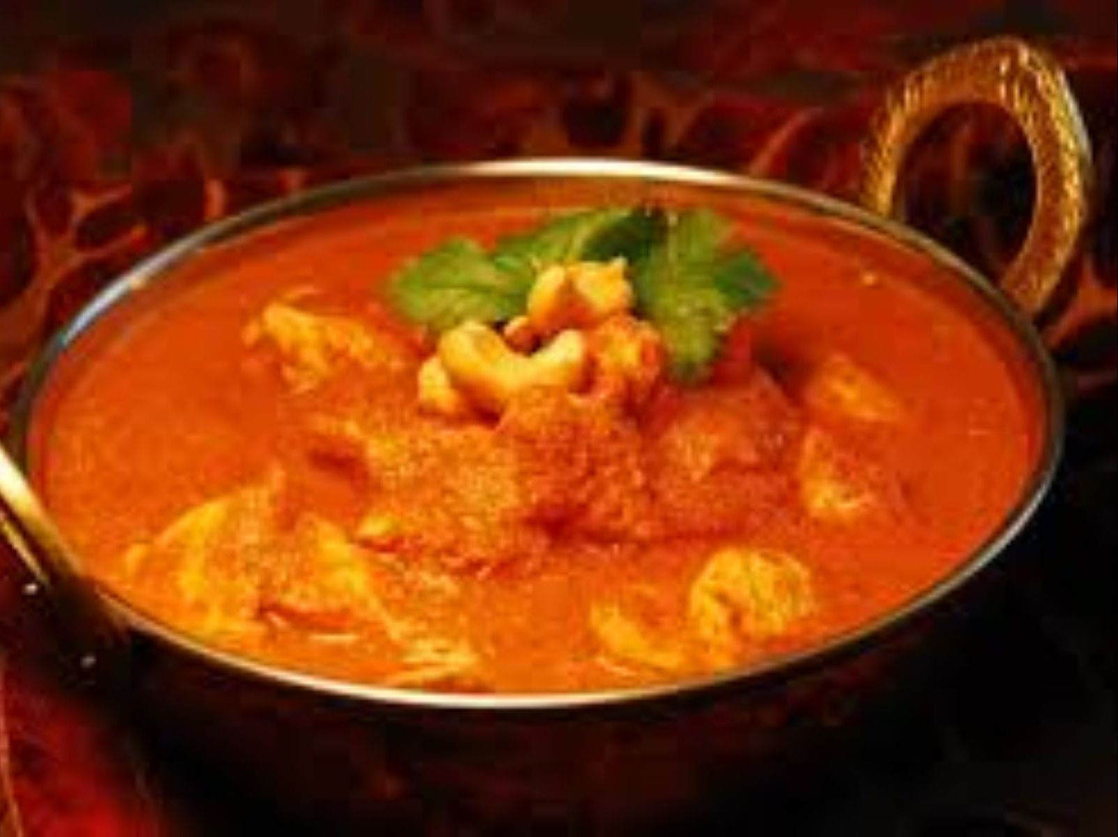 Order Chicken Makhini food online from Passage to India store, Cambridge on bringmethat.com
