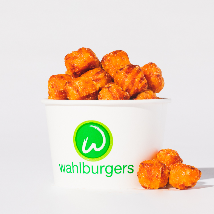 Order Sweet Potato Tots food online from Wahlburgers store, Detroit on bringmethat.com