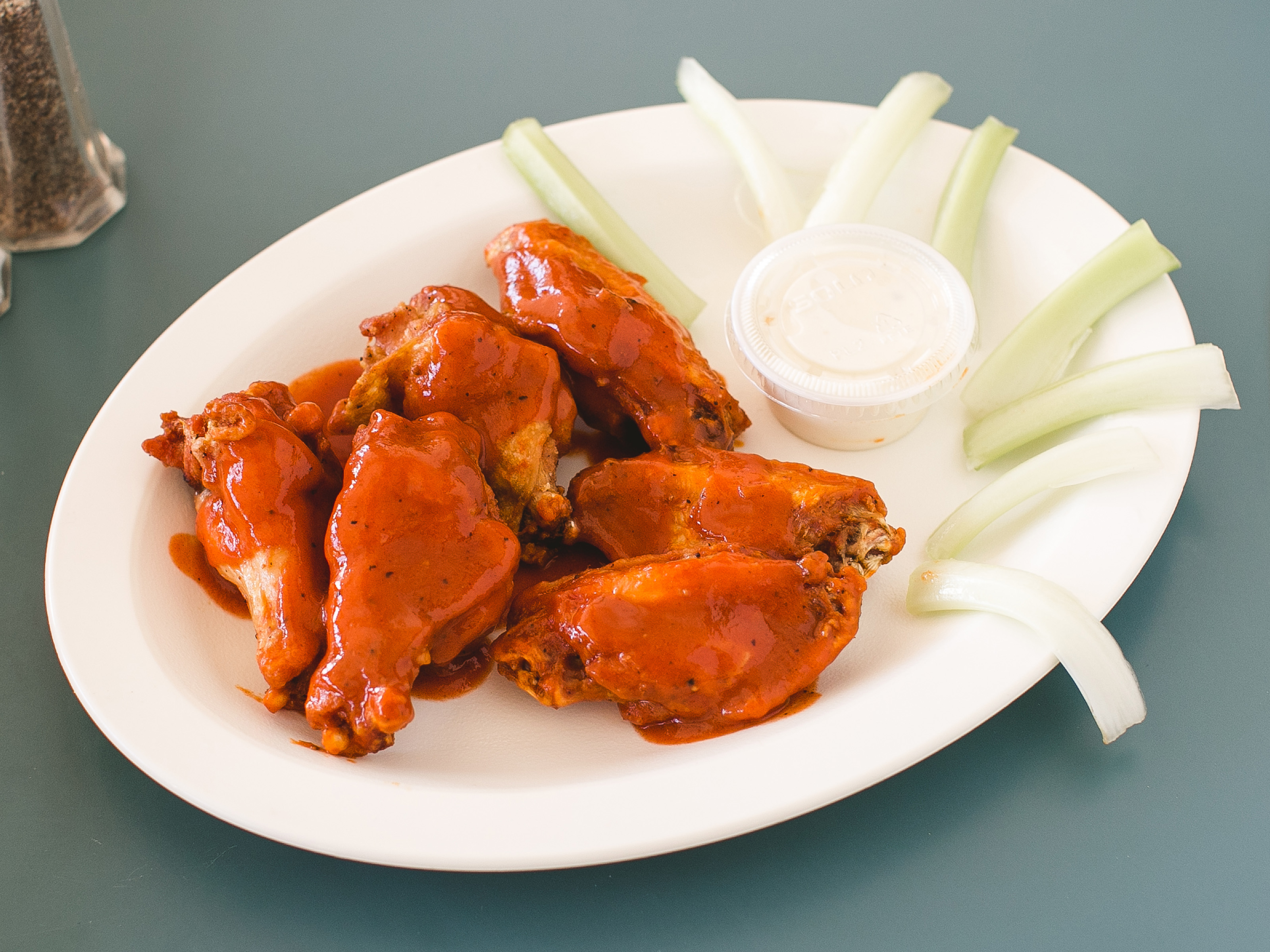 Order Jumbo Buffalo Wings food online from Kosmos Pizza store, Norristown on bringmethat.com
