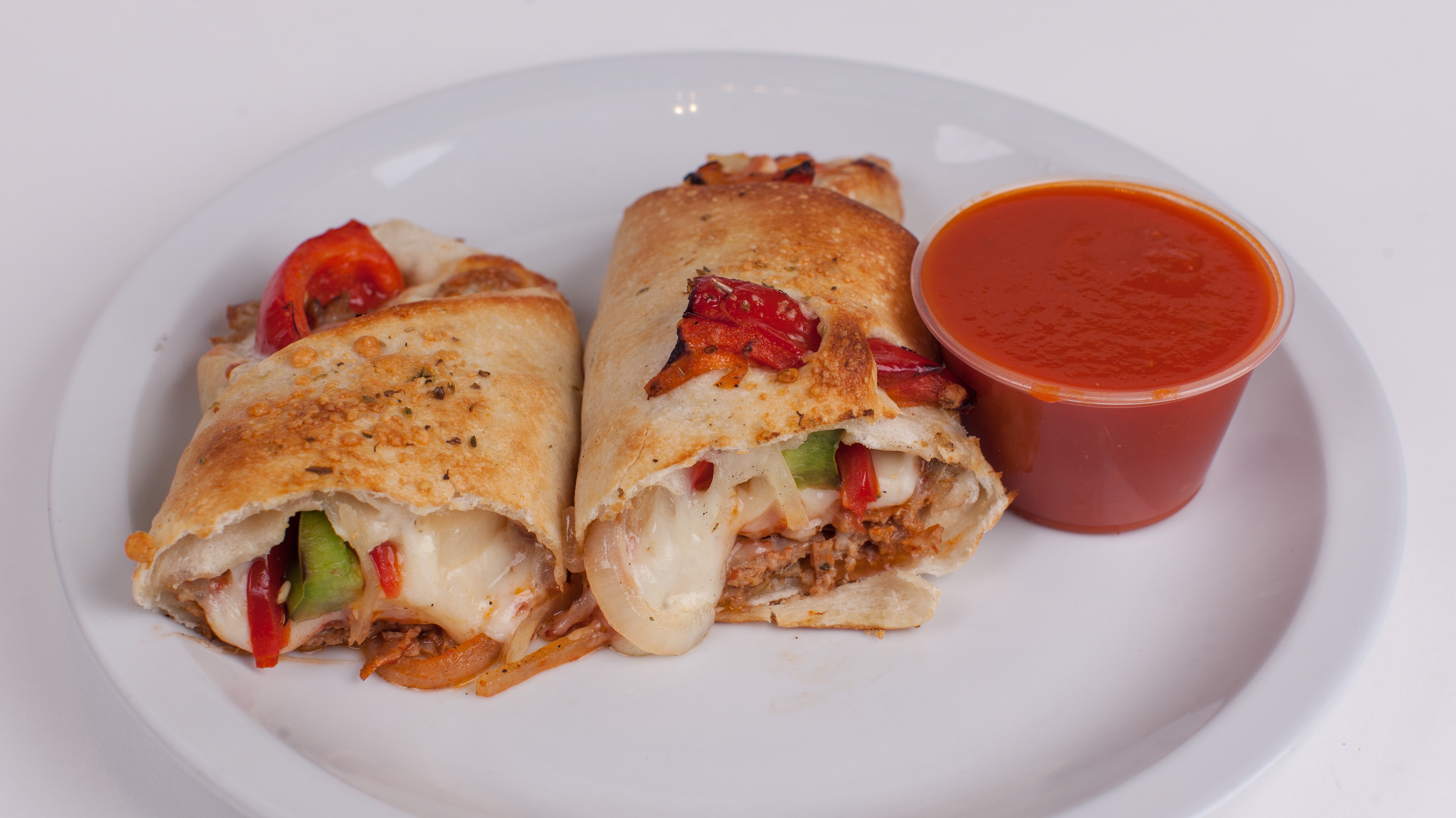 Order Sausage Roll food online from Umberto's Pizzeria store, New Hyde Park on bringmethat.com
