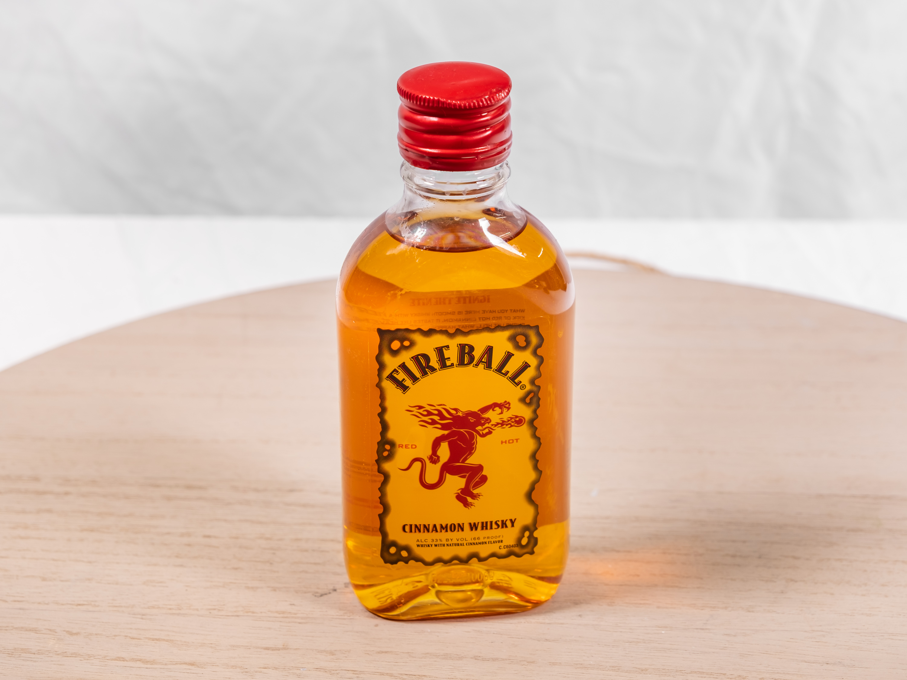 Order 200 ml. Fireball Whisky food online from M & G Market store, Highland on bringmethat.com