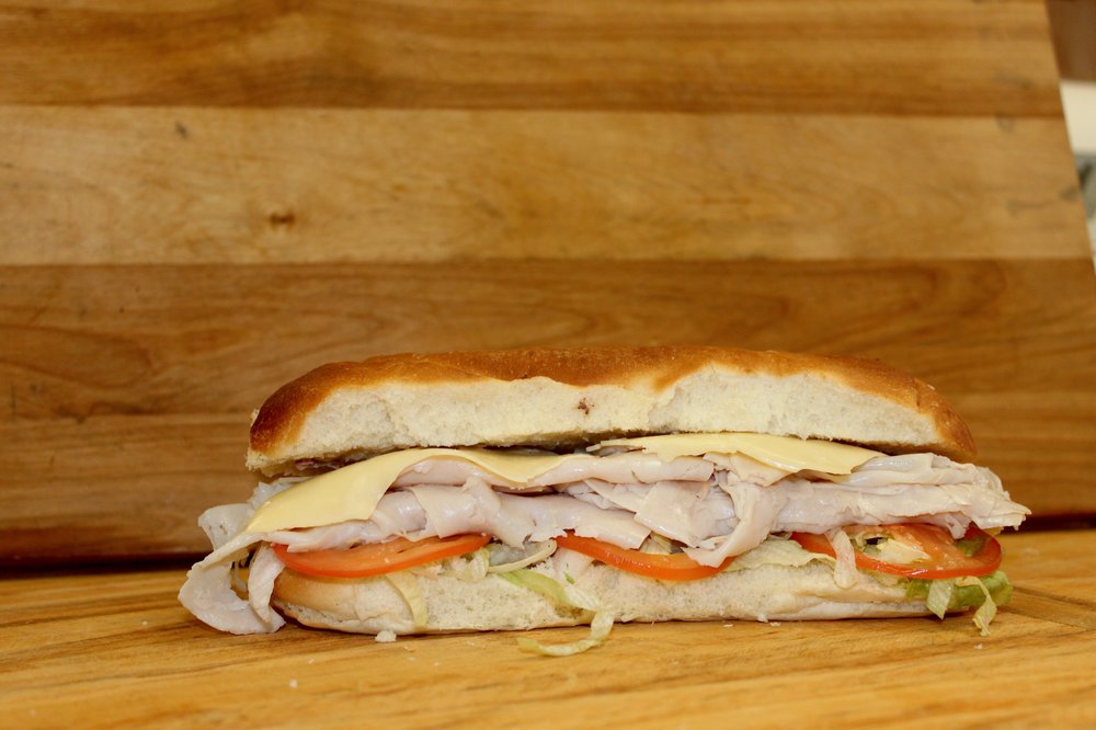 Order Gobbler Submarine food online from Monty Submarines store, Springfield on bringmethat.com