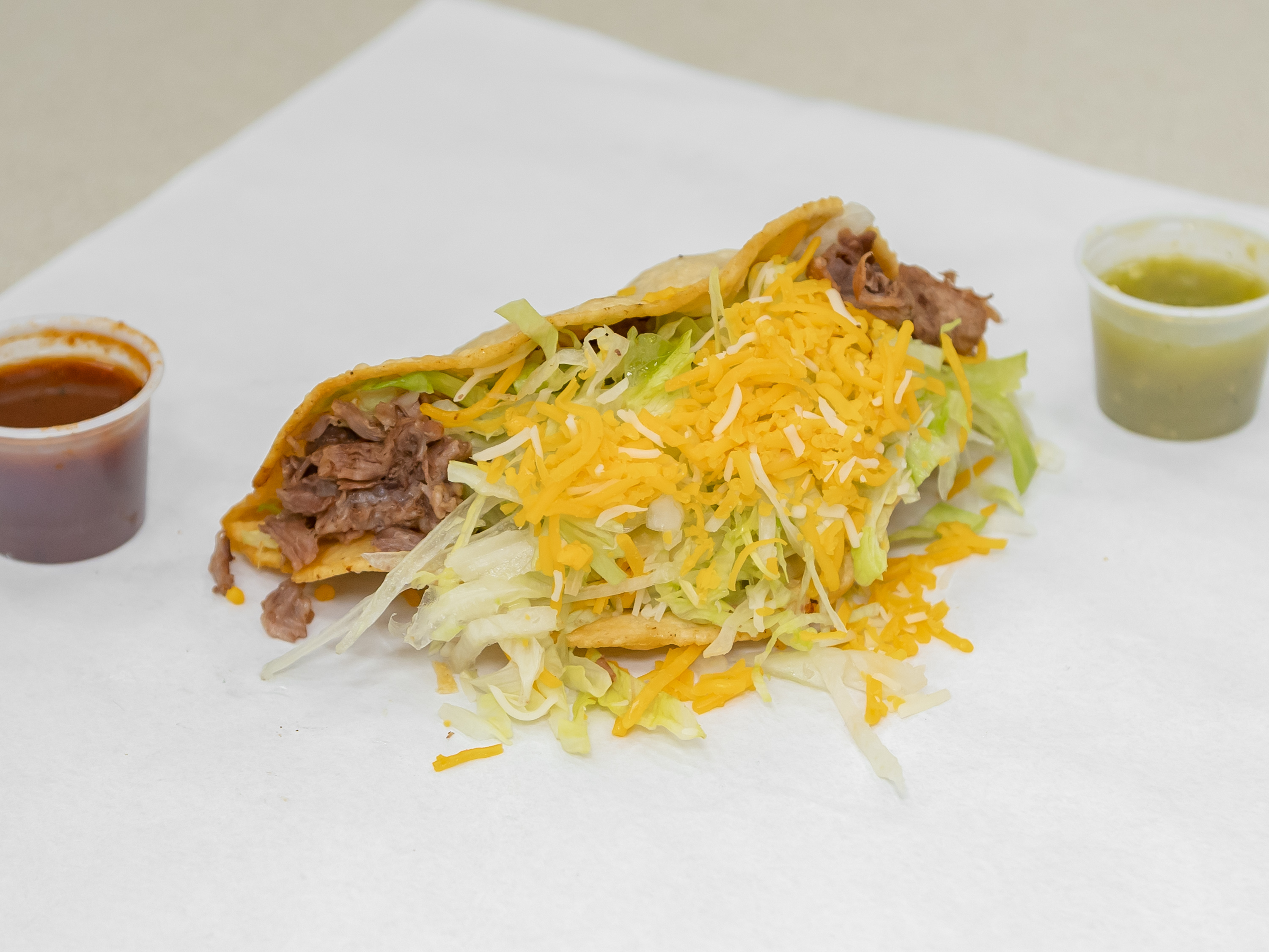 Order Shredded  beef Taco food online from Lambertos Mexican Rest store, La Verne on bringmethat.com