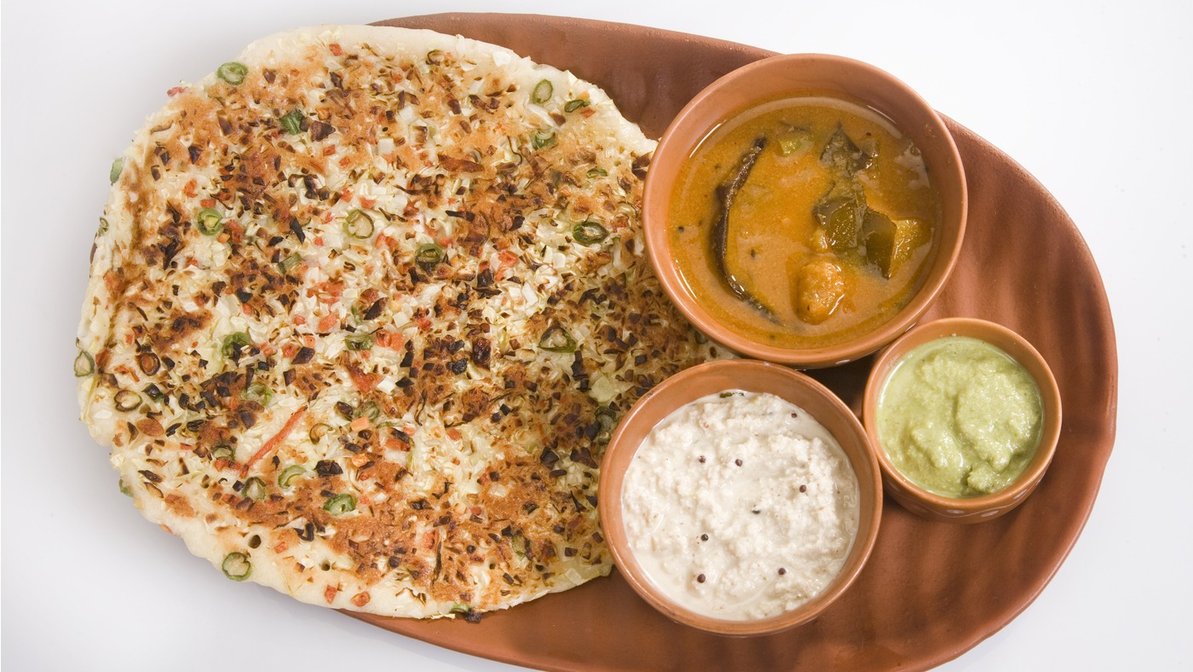 Order Onion Chili Utappam Dosa Special food online from Andhra Mess store, Sunnyvale on bringmethat.com