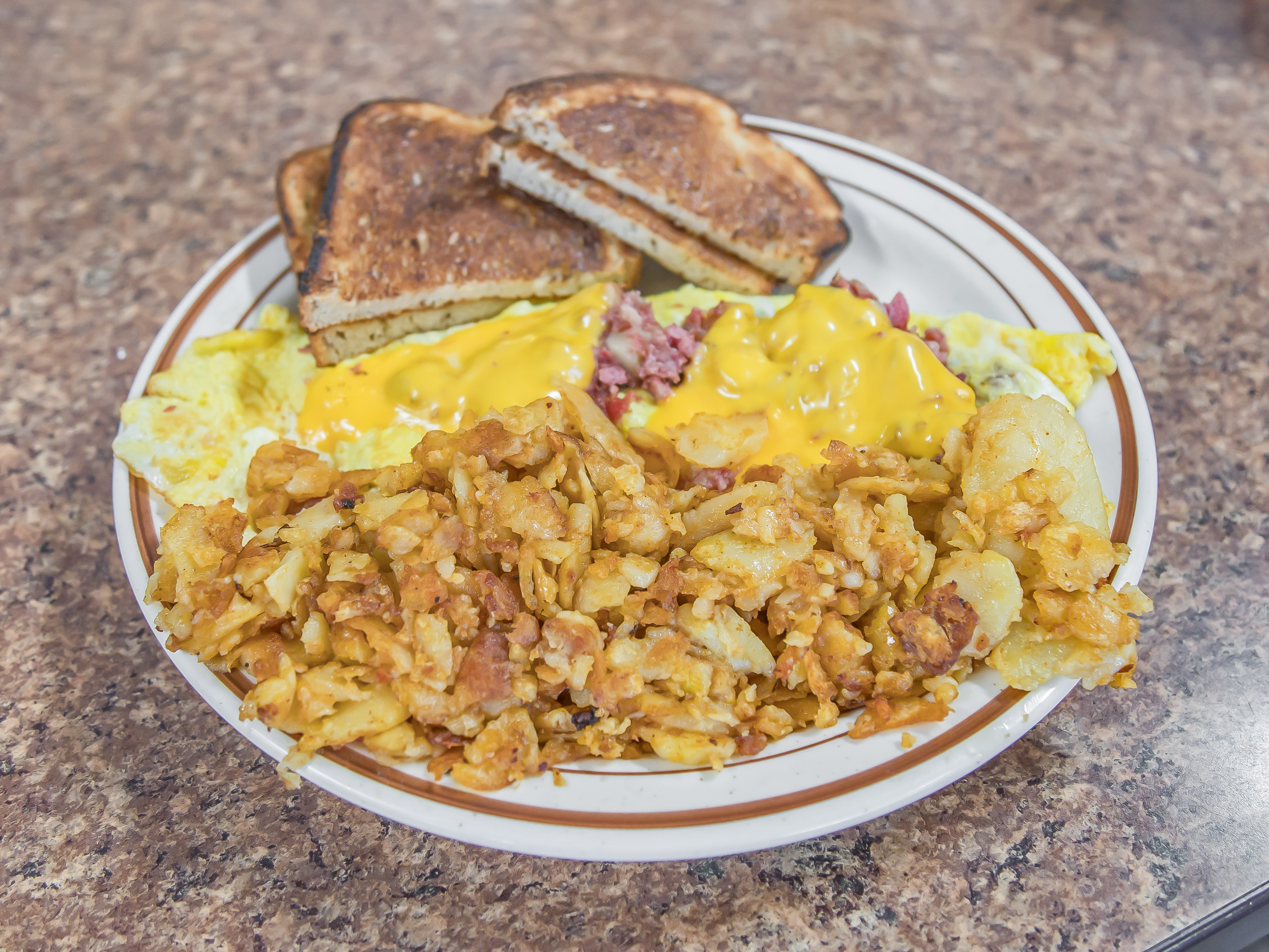 Order Homemade Corned Beef Omelette food online from Parkside Diner store, Rochester on bringmethat.com