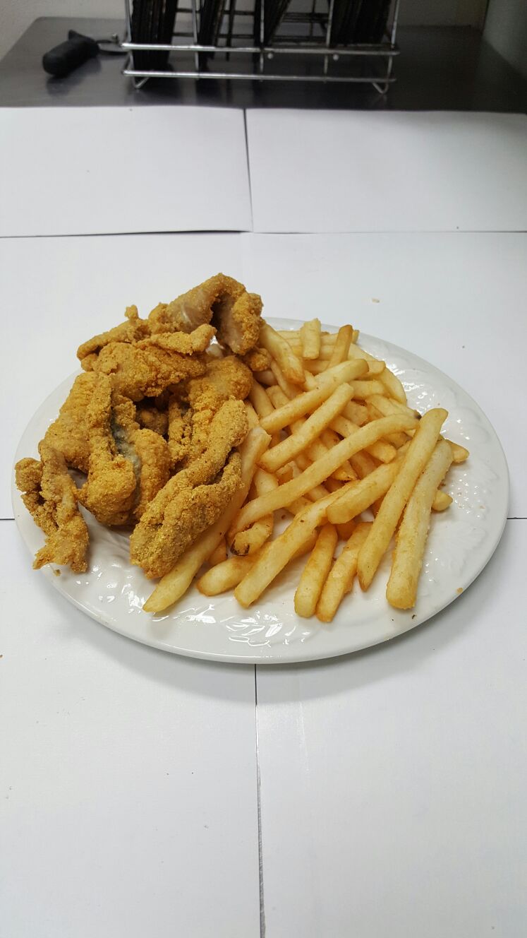 Order Catfish Nuggets Fries, Bread and Coleslaw Daily Special food online from Pizza & Fish Express store, Detroit on bringmethat.com
