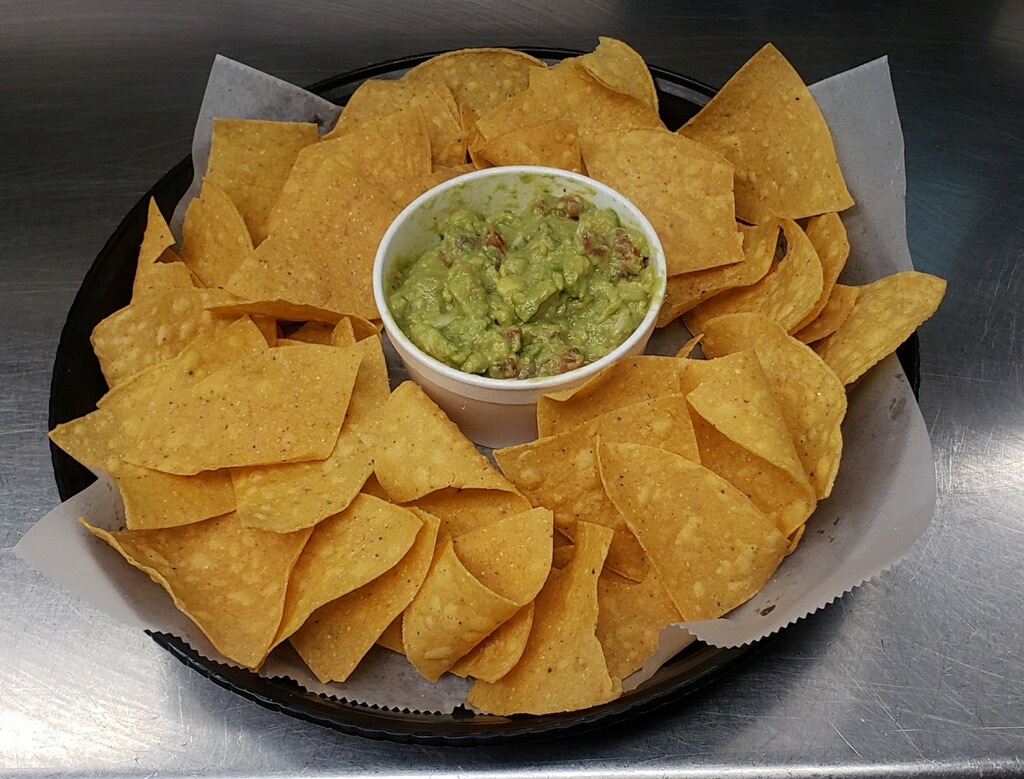 Order Chips and HOMEMADE Guacamole food online from 1st Place Sports Bar store, Hoffman Estates on bringmethat.com