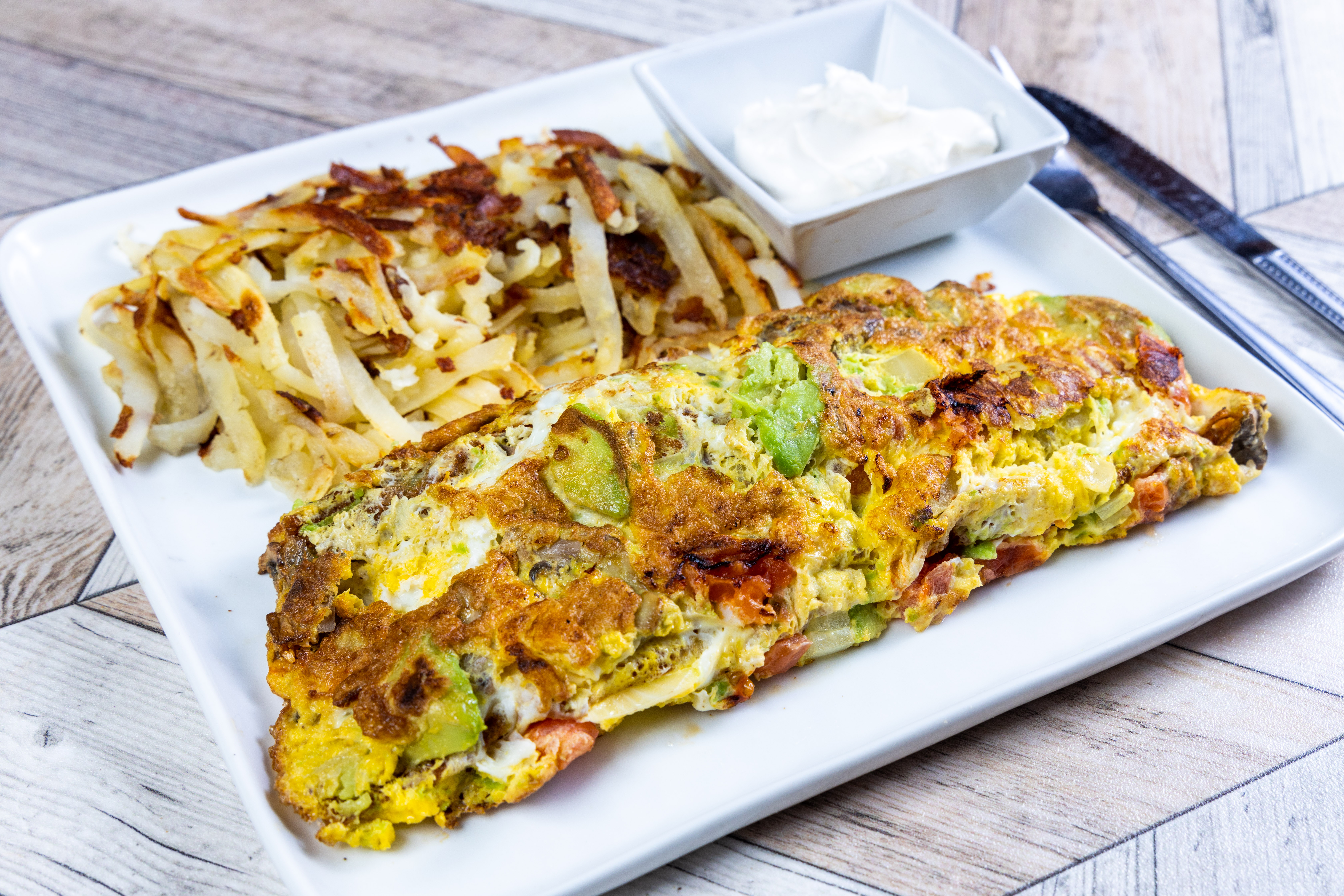 Order California Omelette food online from Top View Restaurant store, Chicago on bringmethat.com