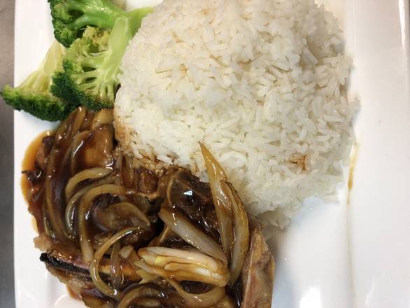 Order 22. Grilled Pork Chop with Onion Rice 洋蔥豬扒飯 food online from E Plus Cafe store, South San Francisco on bringmethat.com