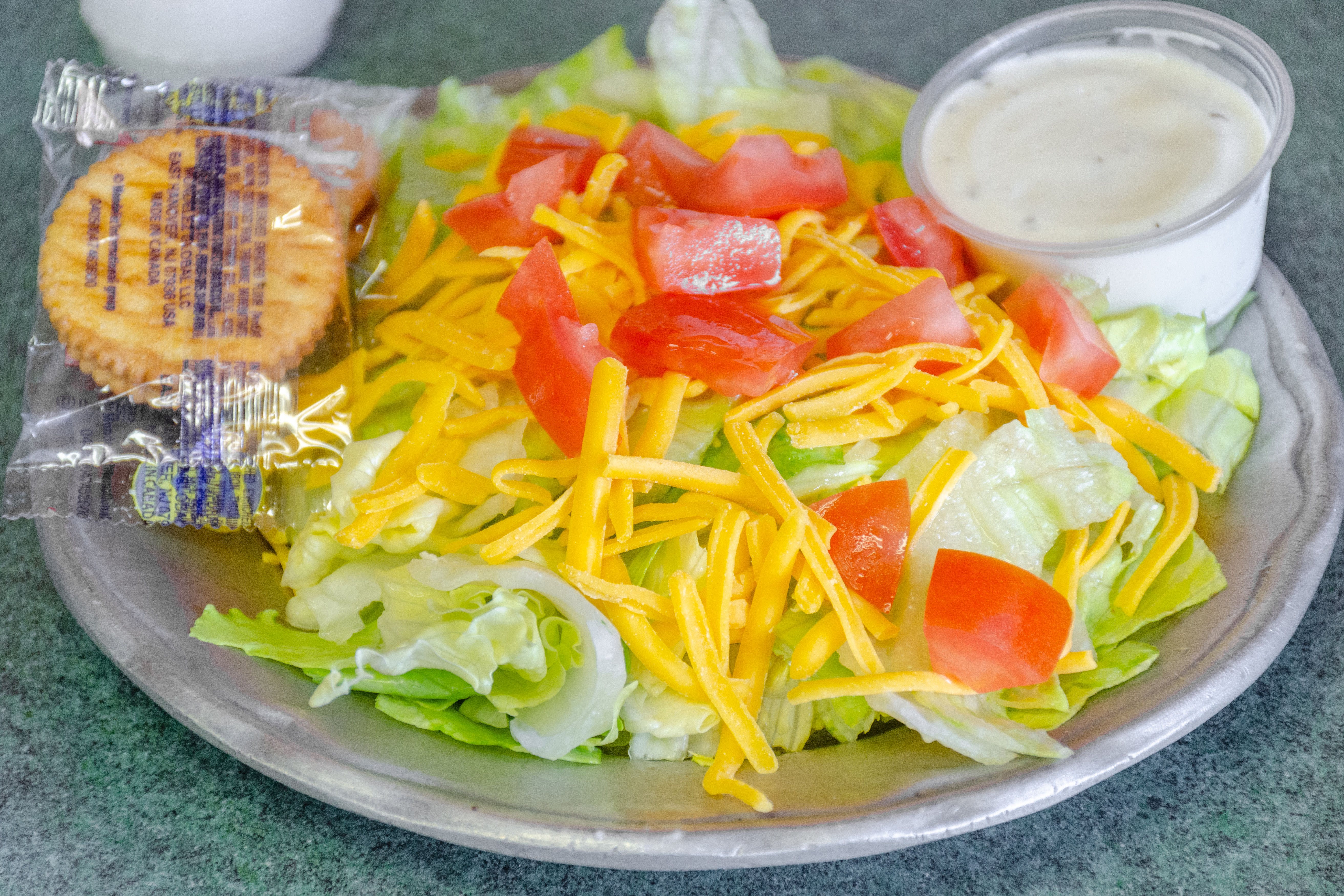Order Tossed Salad - Small food online from Saucy Sisters Pizzeria store, Leesburg on bringmethat.com