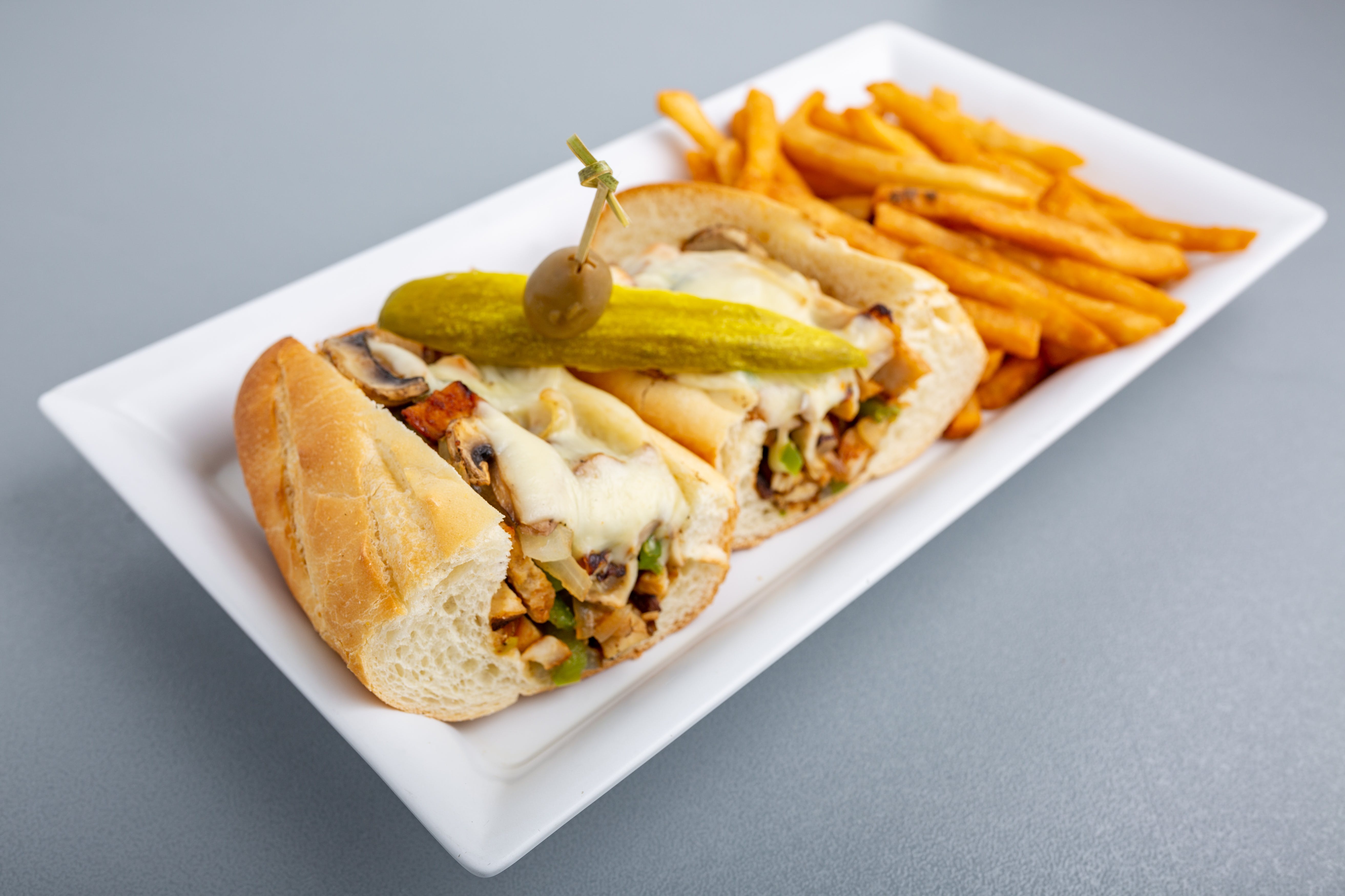 Order Philly Steak Bomb Sandwich - Sandwich food online from Napoli Pizza store, Henderson on bringmethat.com