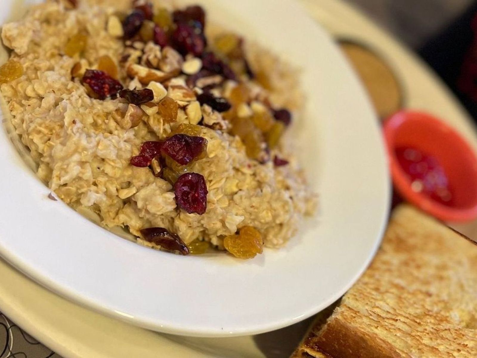 Order Fruit & Nut Oatmeal - OO food online from Biscuits Cafe store, Chandler on bringmethat.com