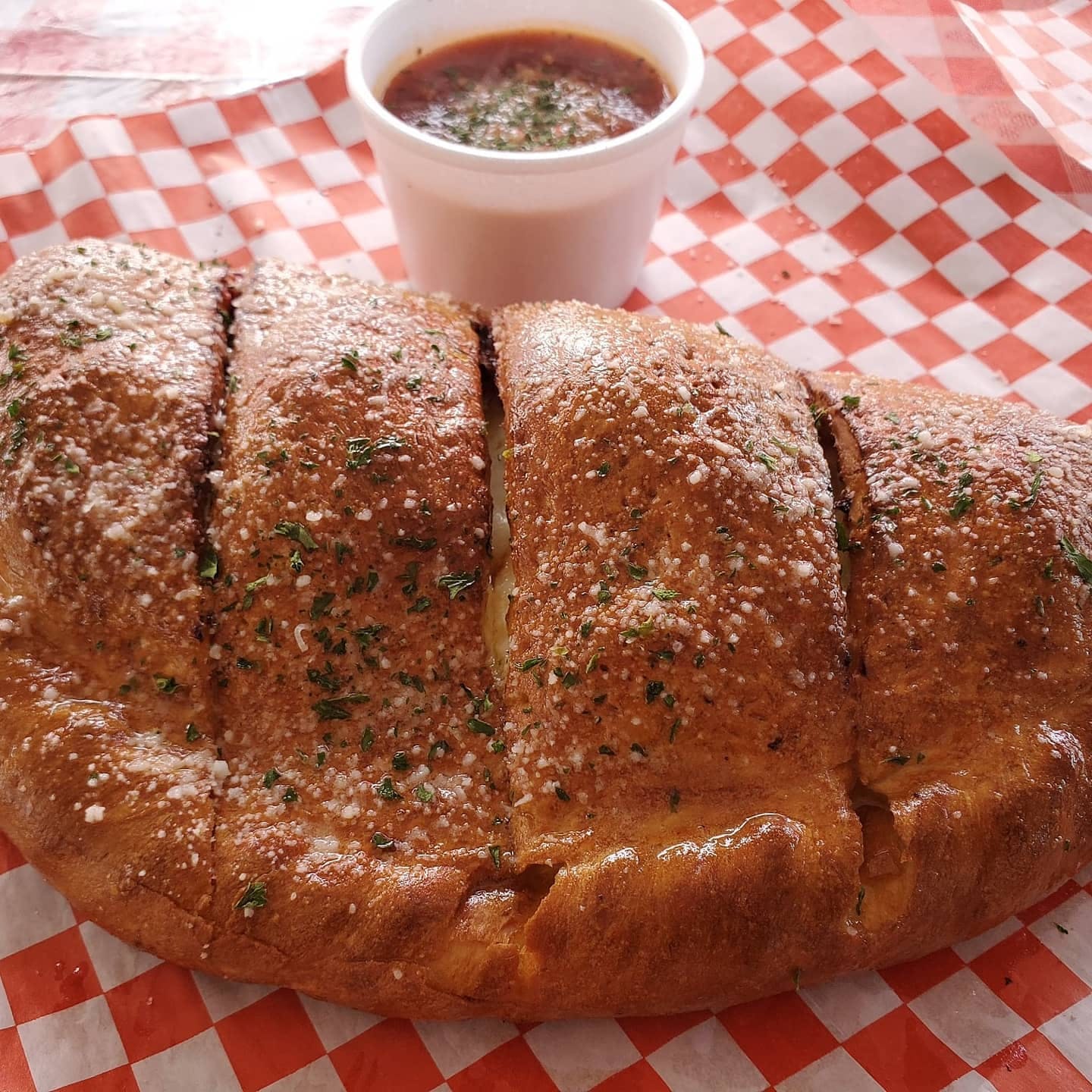 Order Baked Calzone - Calzone food online from Water Street Pizzeria store, Henderson on bringmethat.com