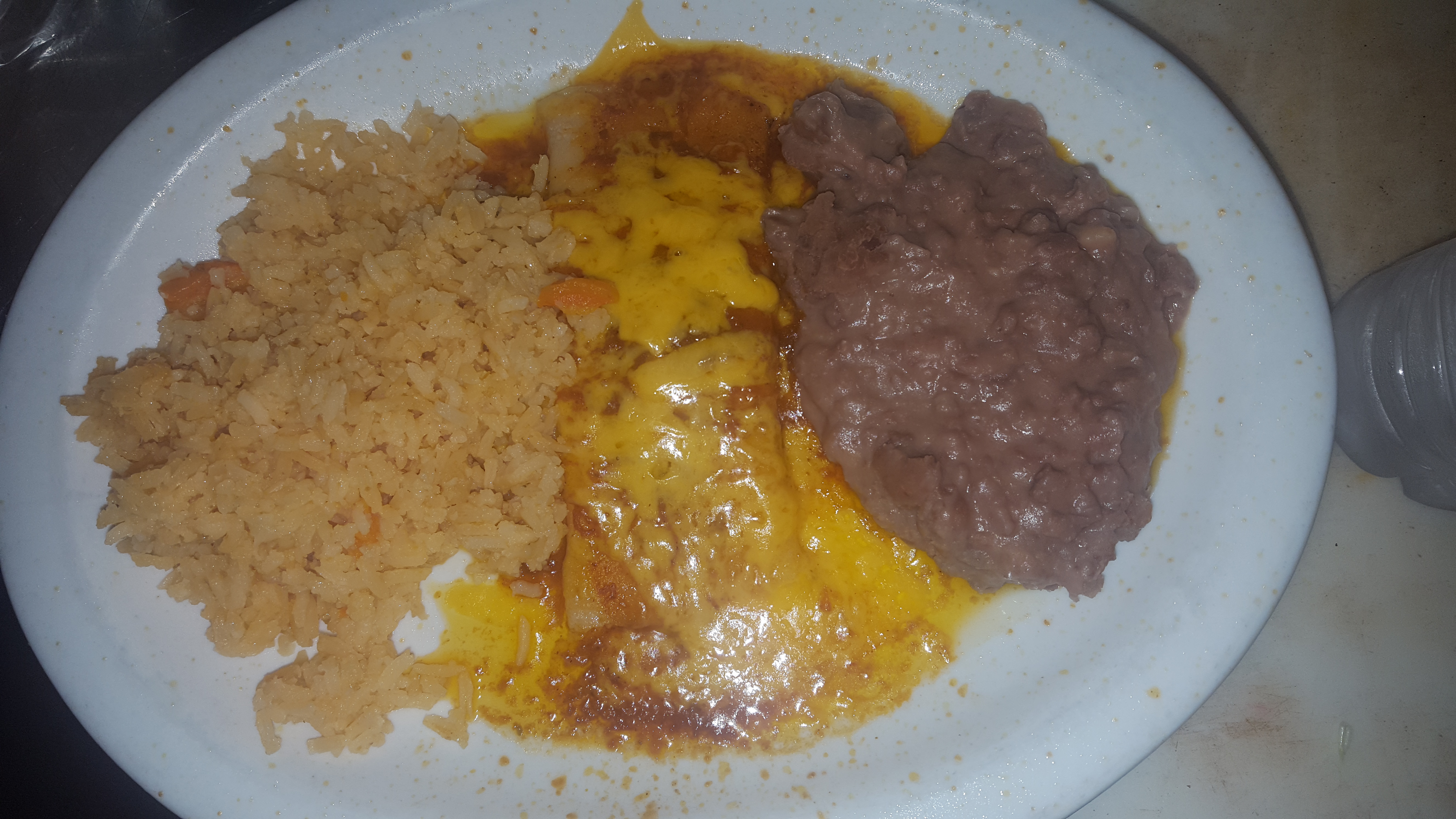 Order Kid's Cheese Enchiladas food online from Cafe Del Sol store, Katy on bringmethat.com
