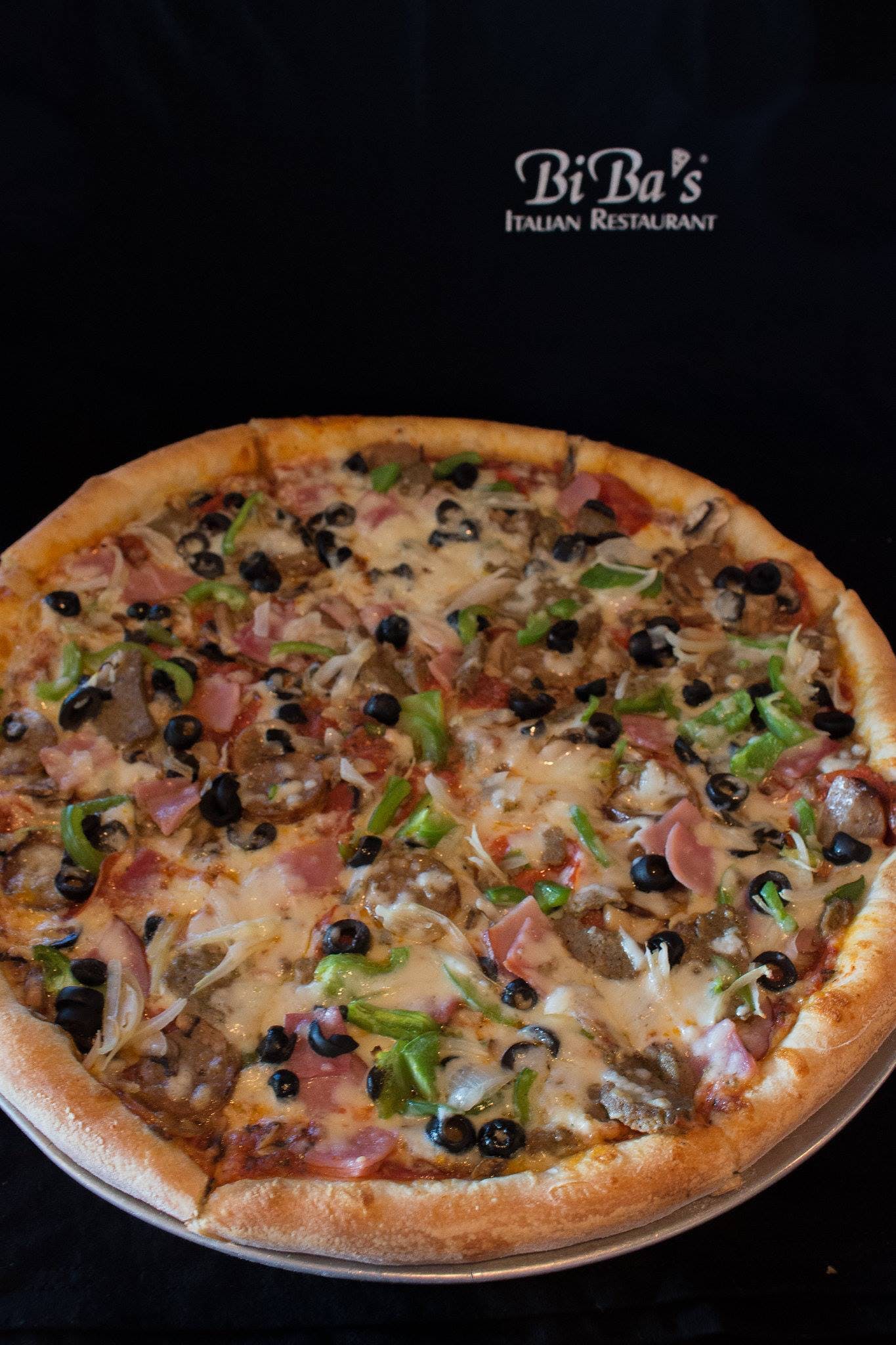 Order The Work's Pizza - Medium 14" (6 Slices) food online from Biba's Italian Restaurant - Hixson store, Hixson on bringmethat.com
