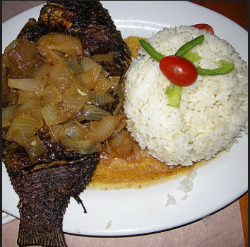 Order Fish Yassa Lunch  food online from Lilly Corner store, Norfolk on bringmethat.com