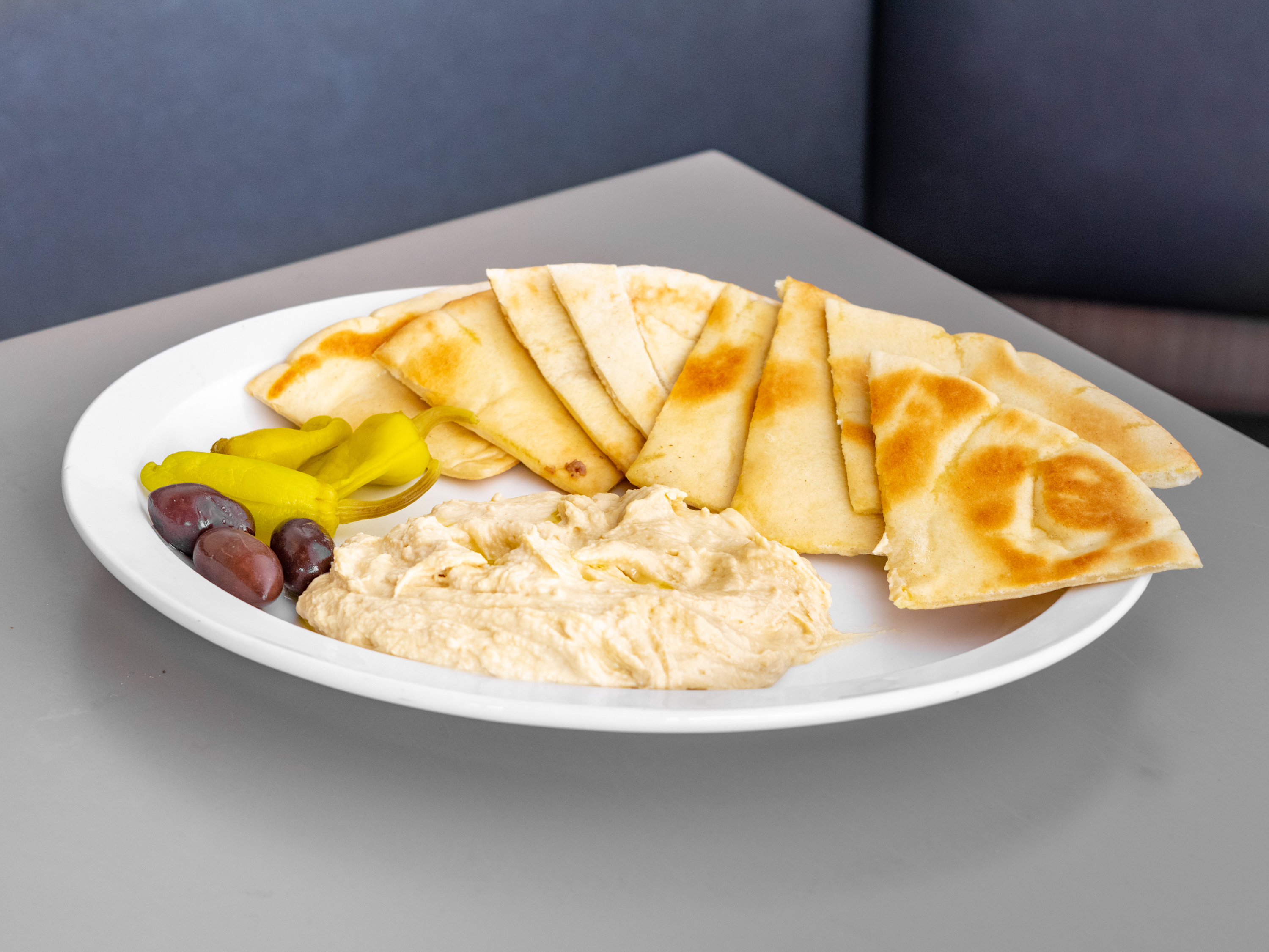 Order Hummus Platter with Gyro food online from Leo Coney Island On Tap (122 Oakes St Sw store, Grand Rapids on bringmethat.com