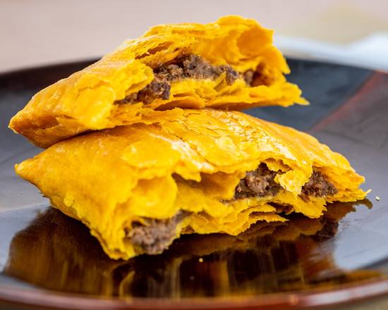 Order Jamaican Curry Chicken Patties food online from IrieJam Island Grill store, Columbus on bringmethat.com