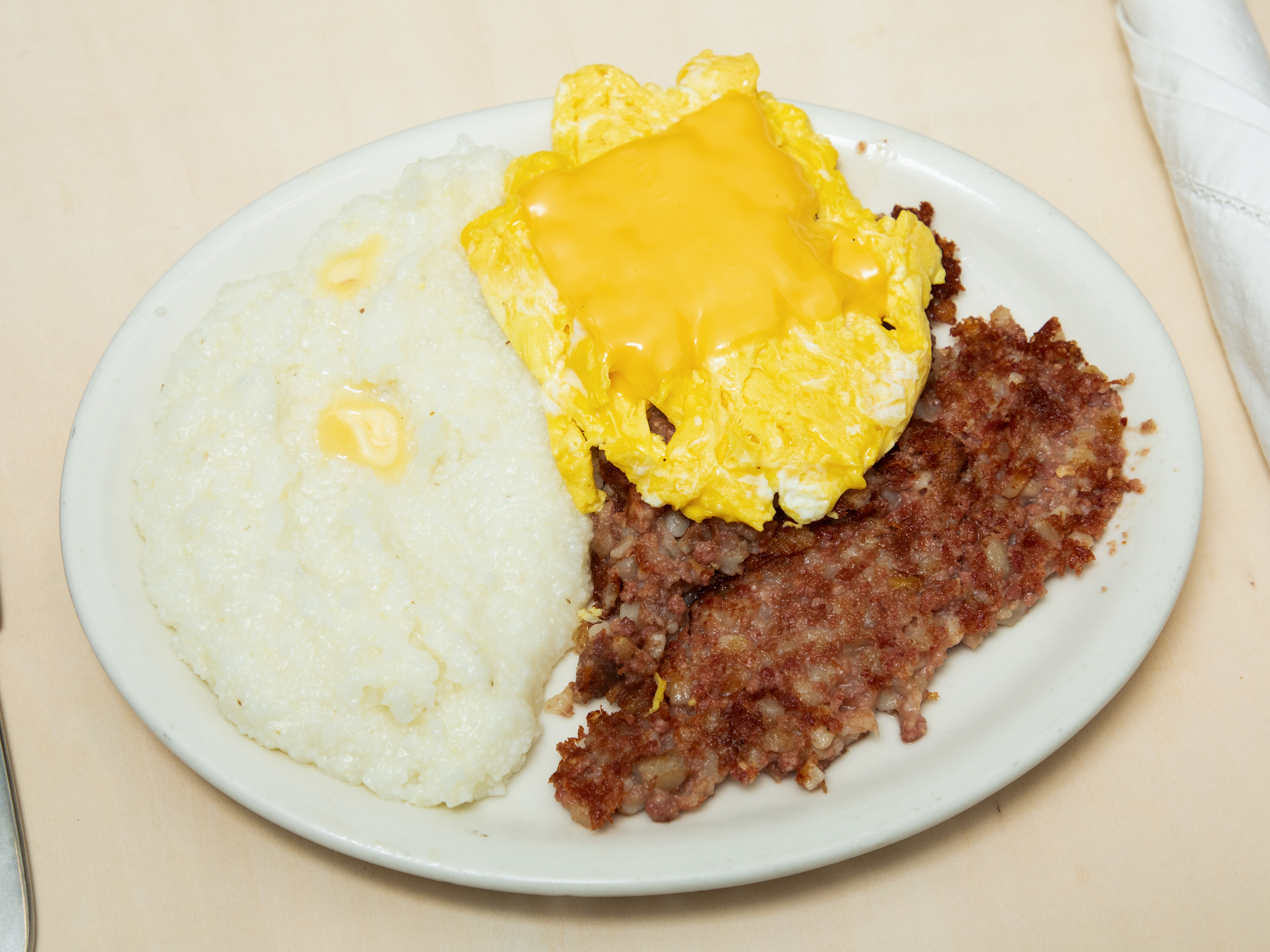 Order 4. Two Eggs any Style with Corned Beef Hash food online from South Pearl Coffee Shop store, Albany on bringmethat.com