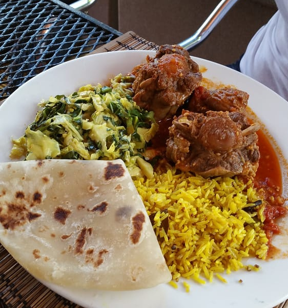 Order Slow Cooked Oxtail food online from Flavors of East Africa store, San Diego on bringmethat.com