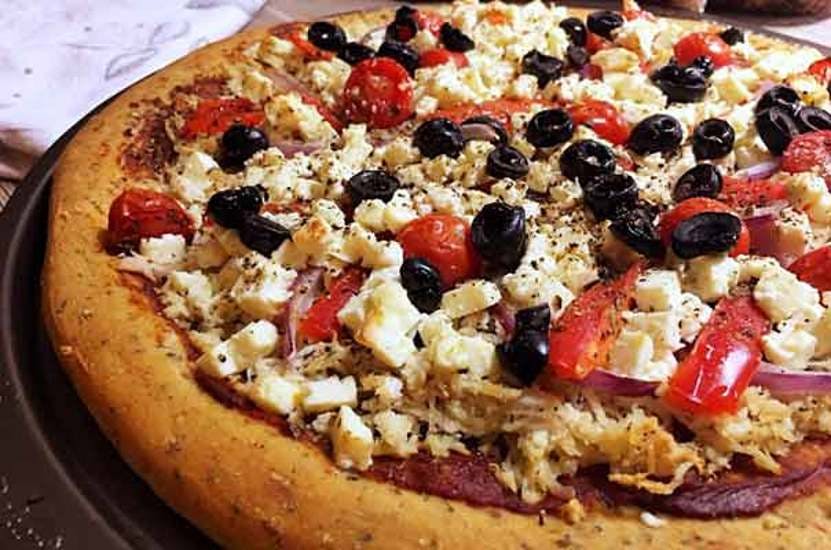 Order Greek Pizza & calzones - Small 10'' food online from Boston House of Pizza store, Brookline on bringmethat.com