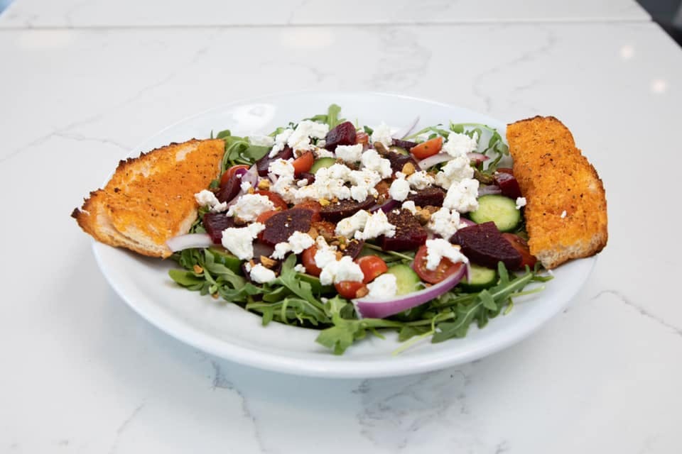 Order Roasted Beets & Goat Cheese Salad - Salad food online from Greco's New York Pizza store, Tarzana on bringmethat.com