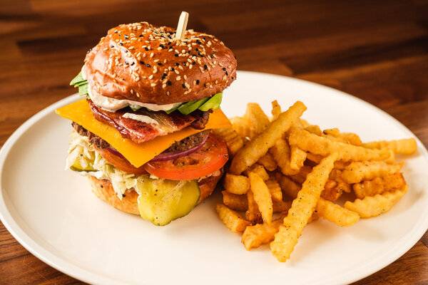 Order Bacon Avocado Burger food online from Mr. Banks Diner store, Commerce on bringmethat.com