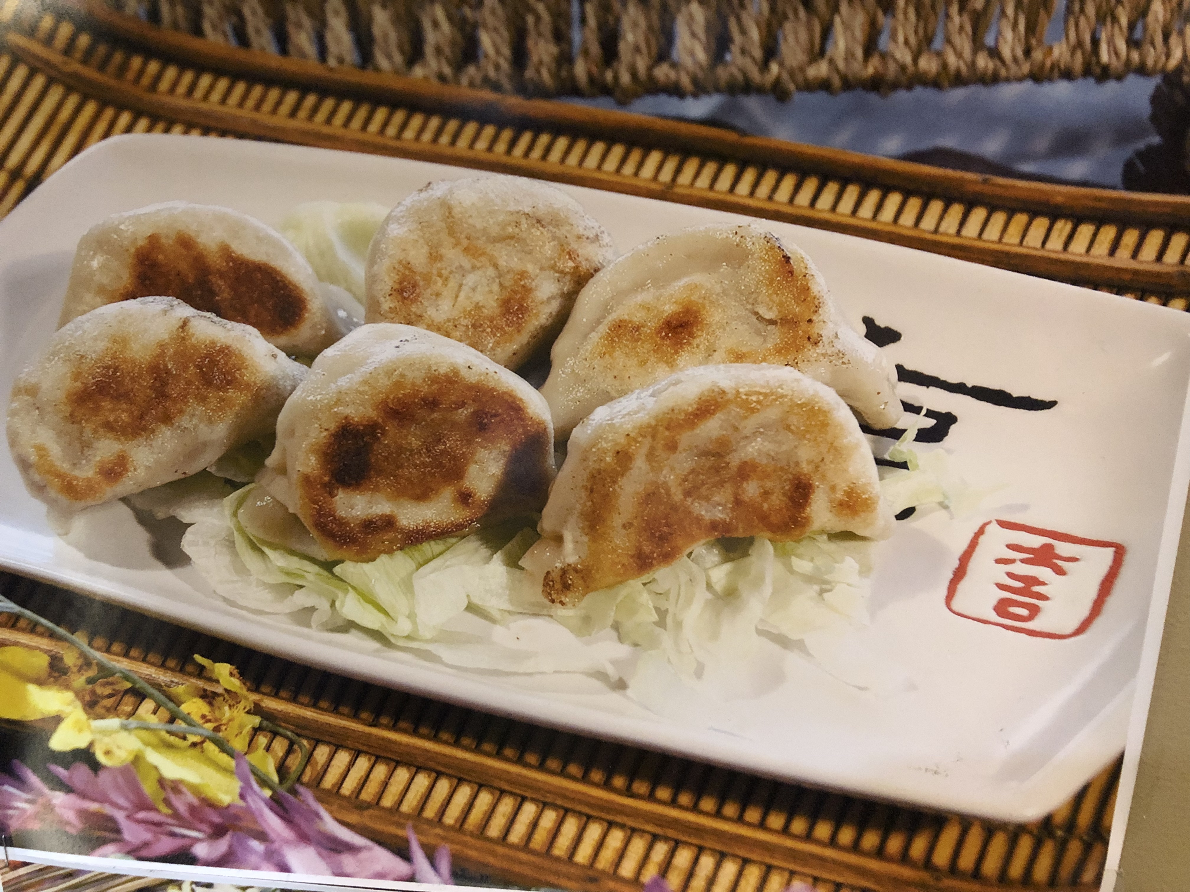 Order 6 Pan Fried Pork Dumplings food online from Taipei Express store, Houston on bringmethat.com