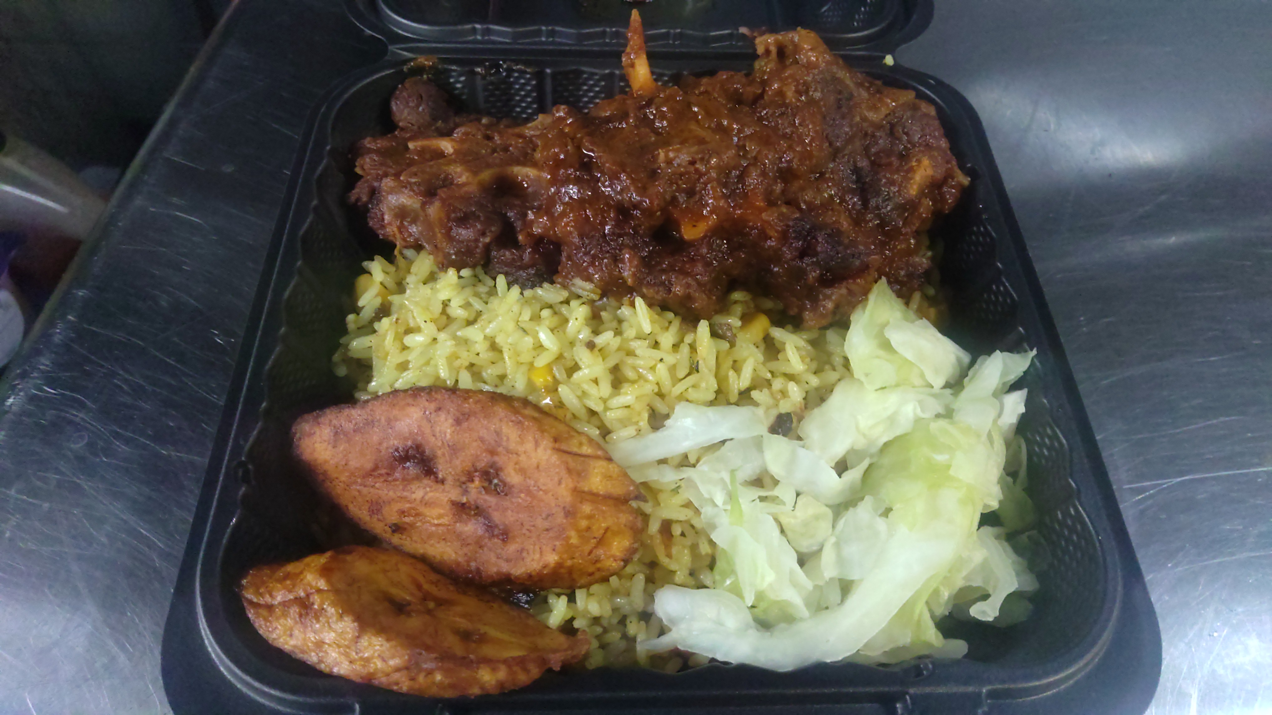 Order 2a. Rice with Oxtail  food online from Africana Cuisine store, Perry Hall on bringmethat.com